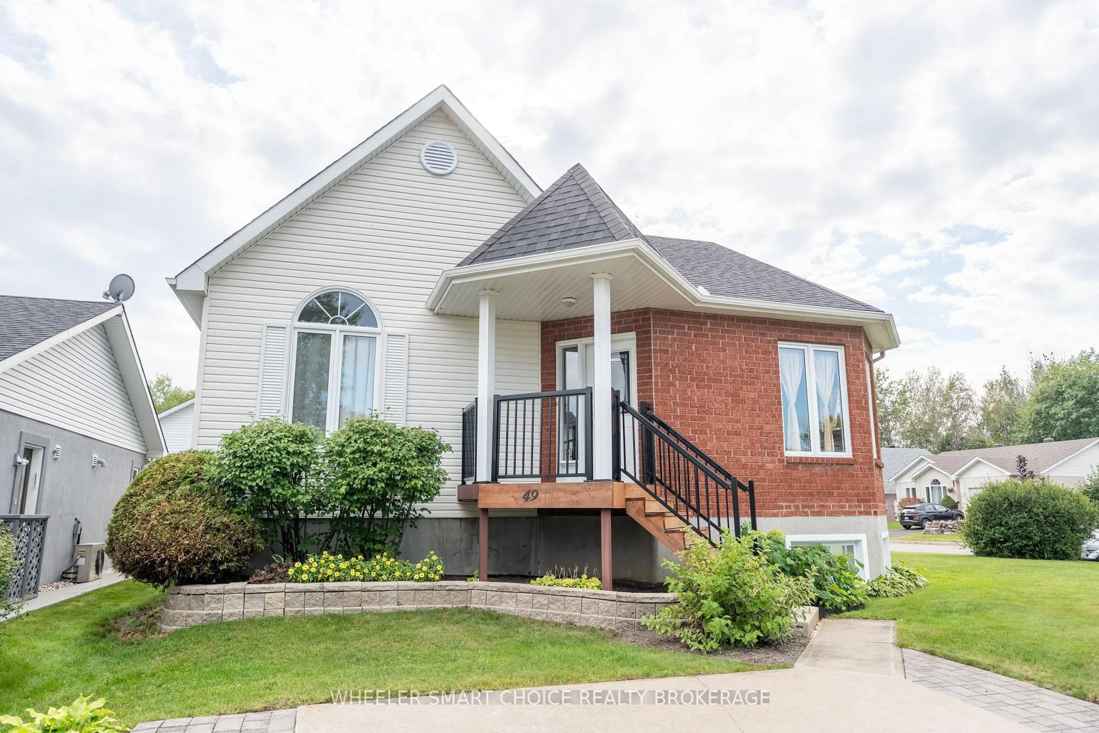 Home with brick exterior material, street for 49 Barnhart Dr, South Stormont Ontario K0C 1P0