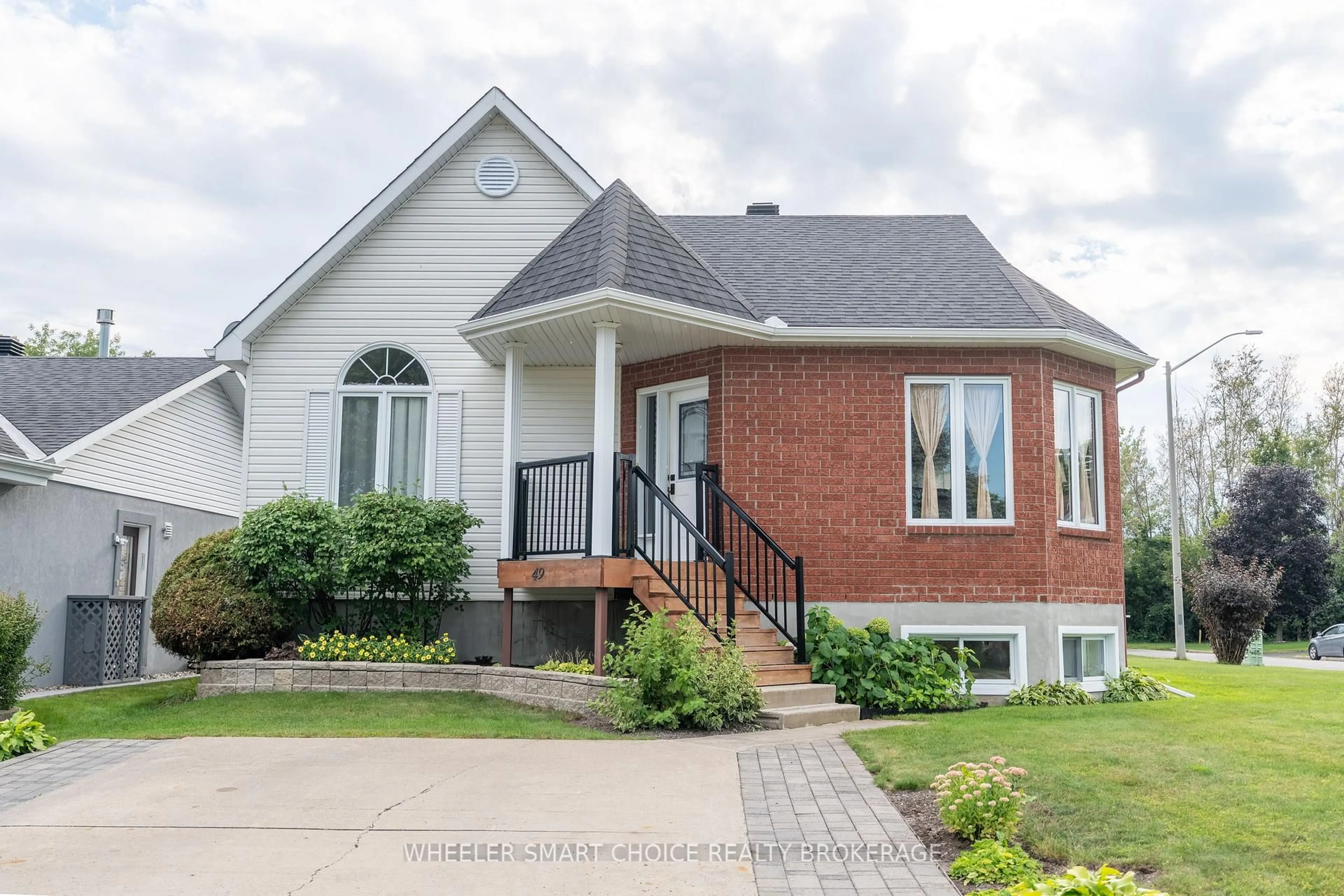 Home with brick exterior material, street for 49 Barnhart Dr, South Stormont Ontario K0C 1P0