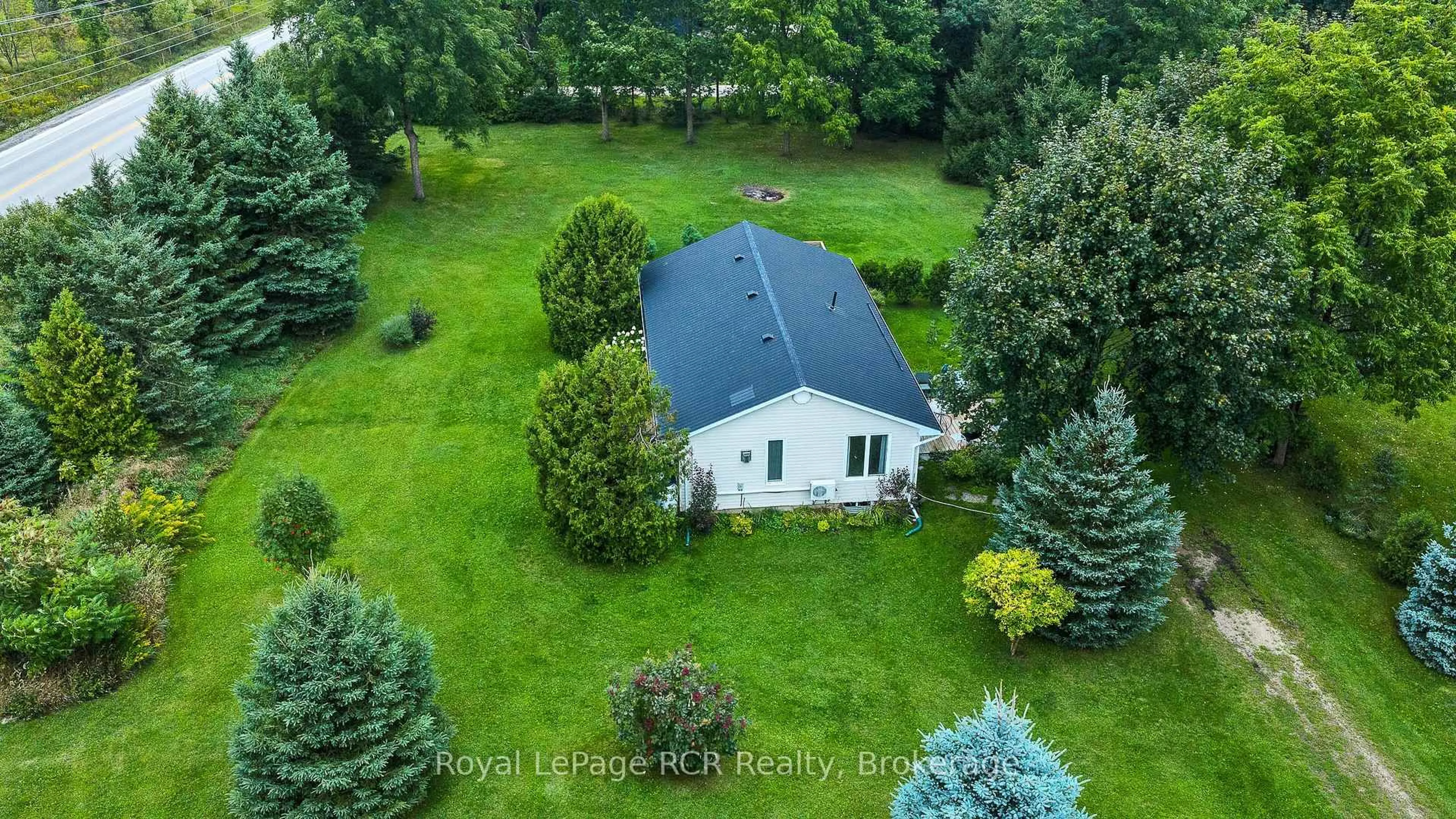 A pic from outside/outdoor area/front of a property/back of a property/a pic from drone, forest/trees view for 046285 Old Mail Rd, Meaford Ontario N4L 1W7