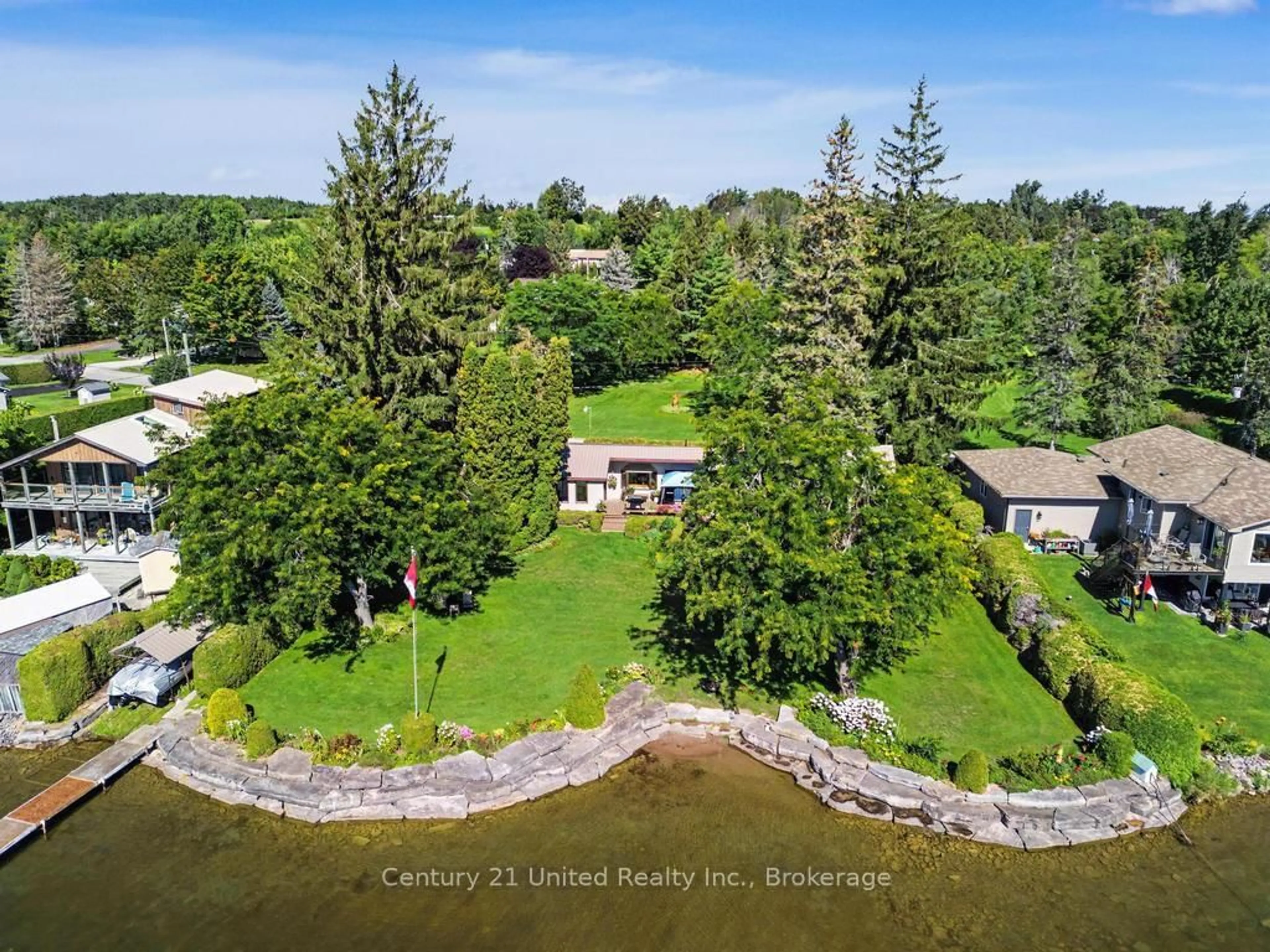 A pic from outside/outdoor area/front of a property/back of a property/a pic from drone, water/lake/river/ocean view for 803 Sidney Dr, Selwyn Ontario K0L 1T0