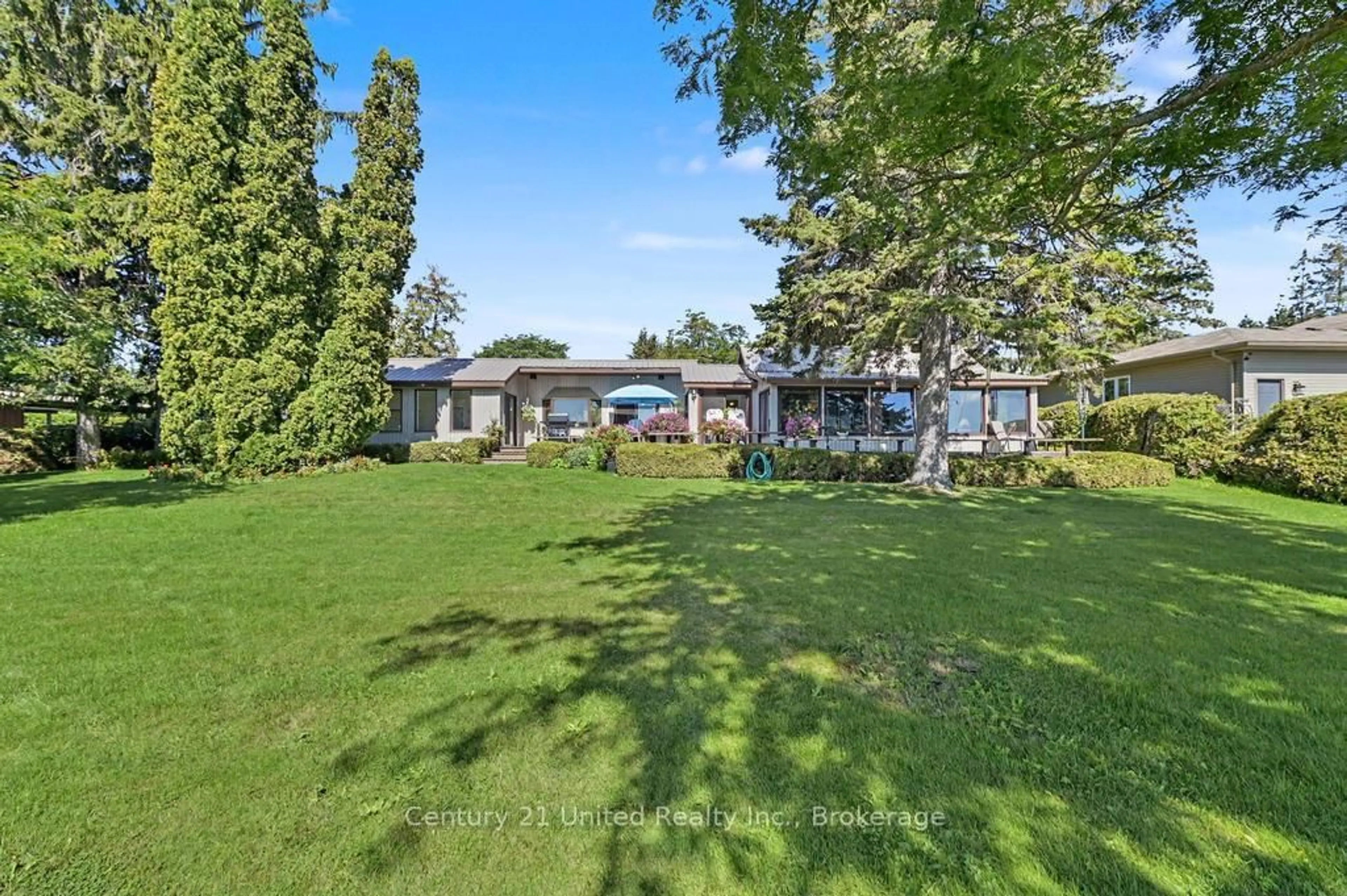 A pic from outside/outdoor area/front of a property/back of a property/a pic from drone, water/lake/river/ocean view for 803 Sidney Dr, Selwyn Ontario K0L 1T0