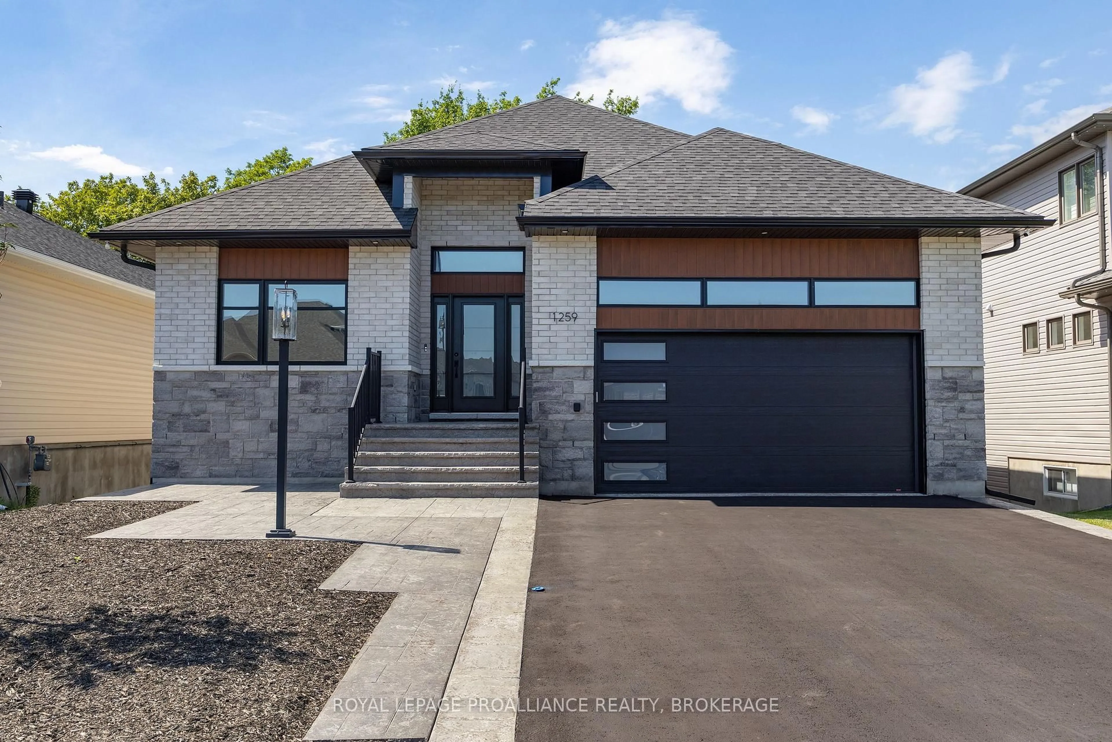 Home with brick exterior material, street for 1259 Carfa Cres, Kingston Ontario K7P 0M7