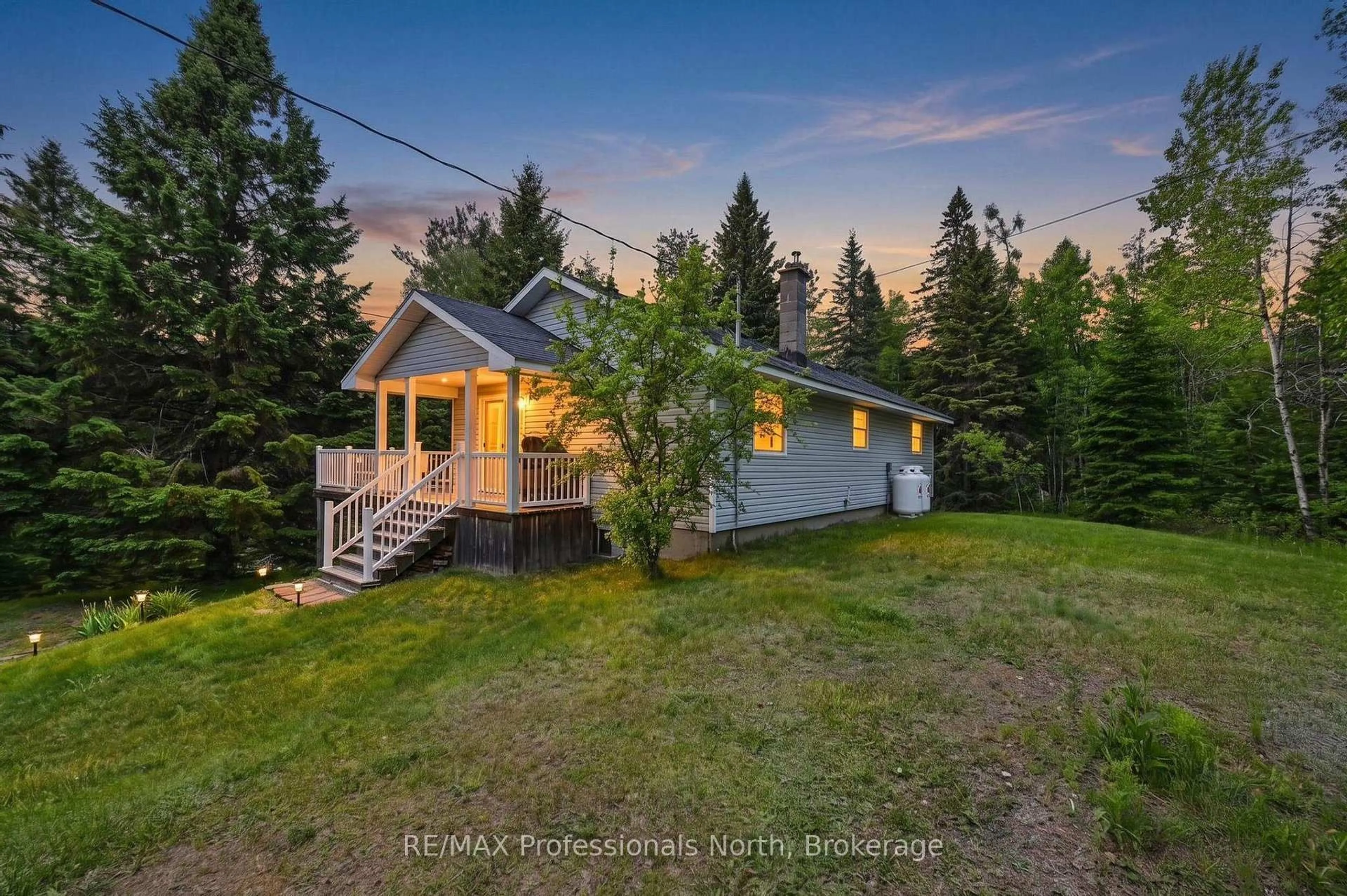 A pic from outside/outdoor area/front of a property/back of a property/a pic from drone, unknown for 3186 COUNTY ROAD 121 Rd, Trent Lakes Ontario K0M 1C0