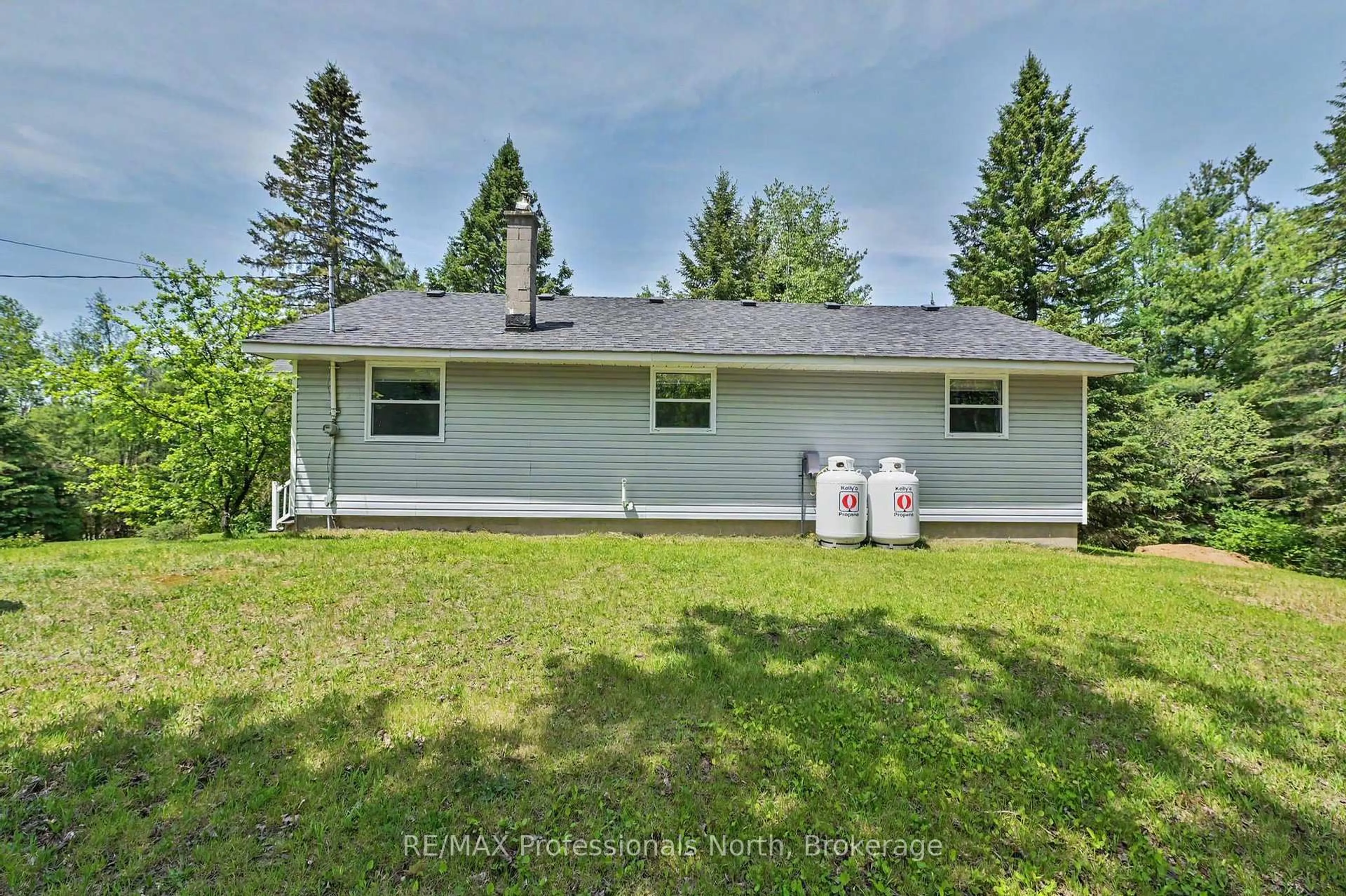 A pic from outside/outdoor area/front of a property/back of a property/a pic from drone, unknown for 3186 COUNTY ROAD 121 Rd, Trent Lakes Ontario K0M 1C0
