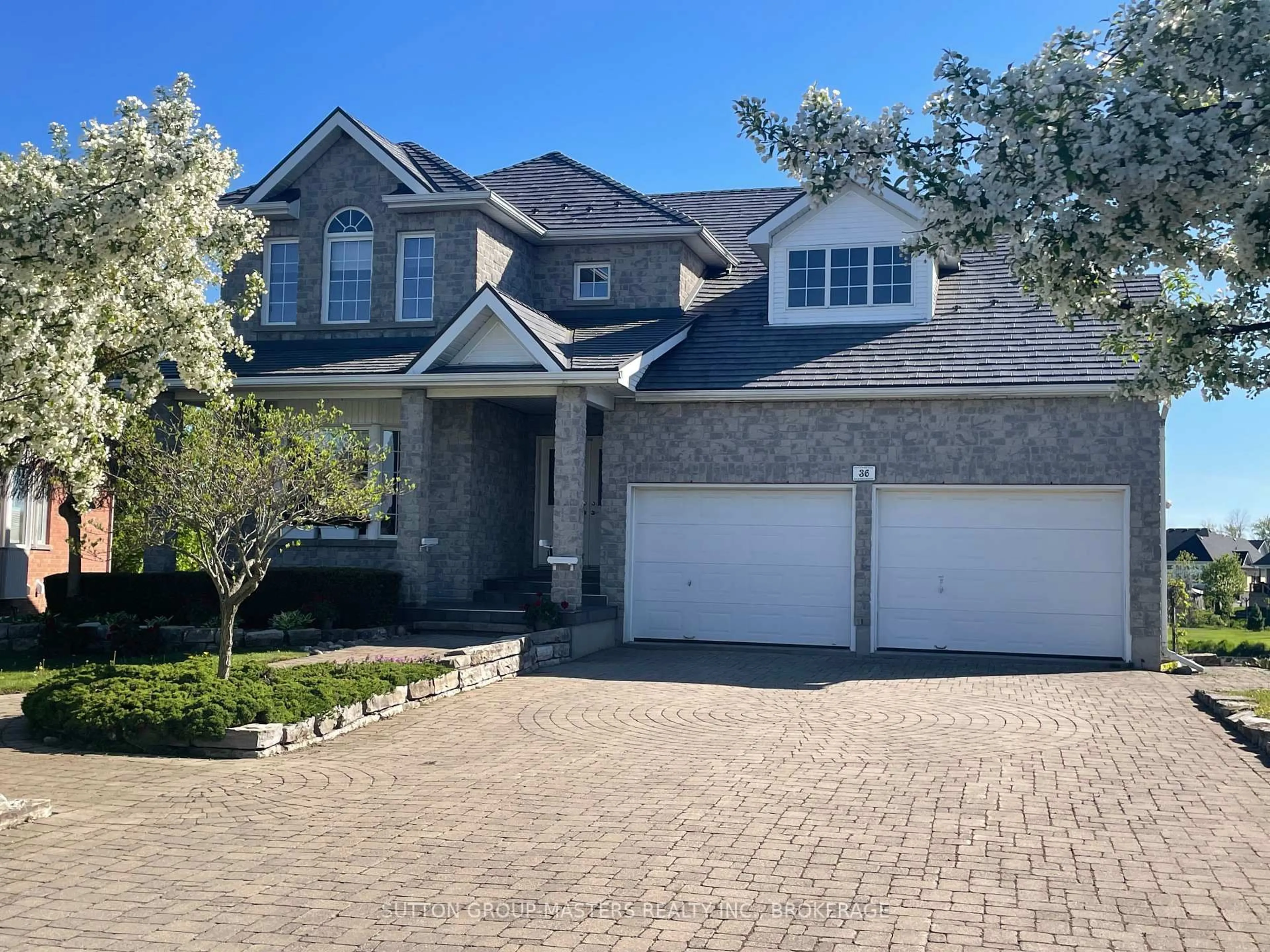 Home with brick exterior material, street for 36 Glenora Dr, Bath Ontario K0H 1G0