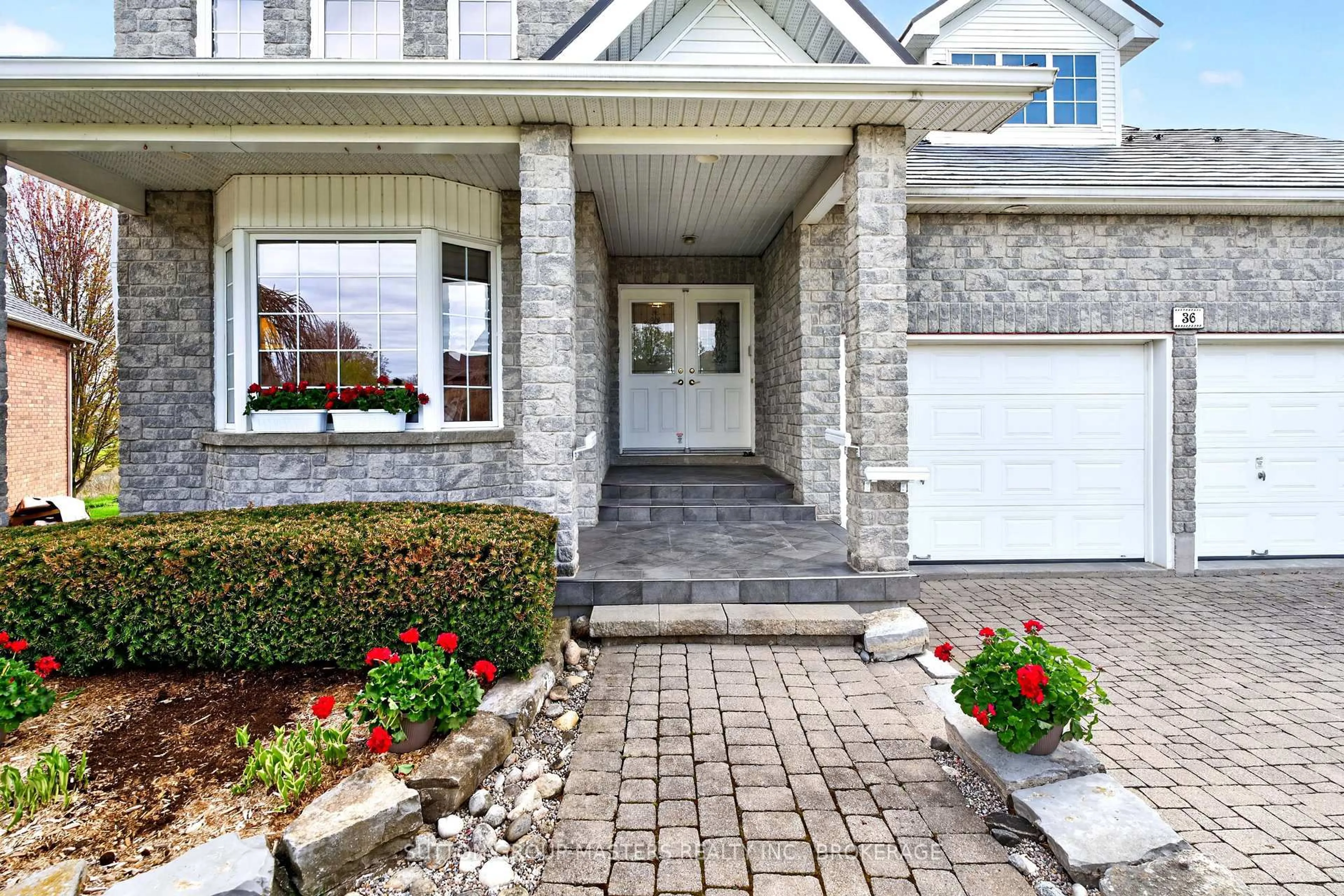 Home with brick exterior material, street for 36 Glenora Dr, Bath Ontario K0H 1G0