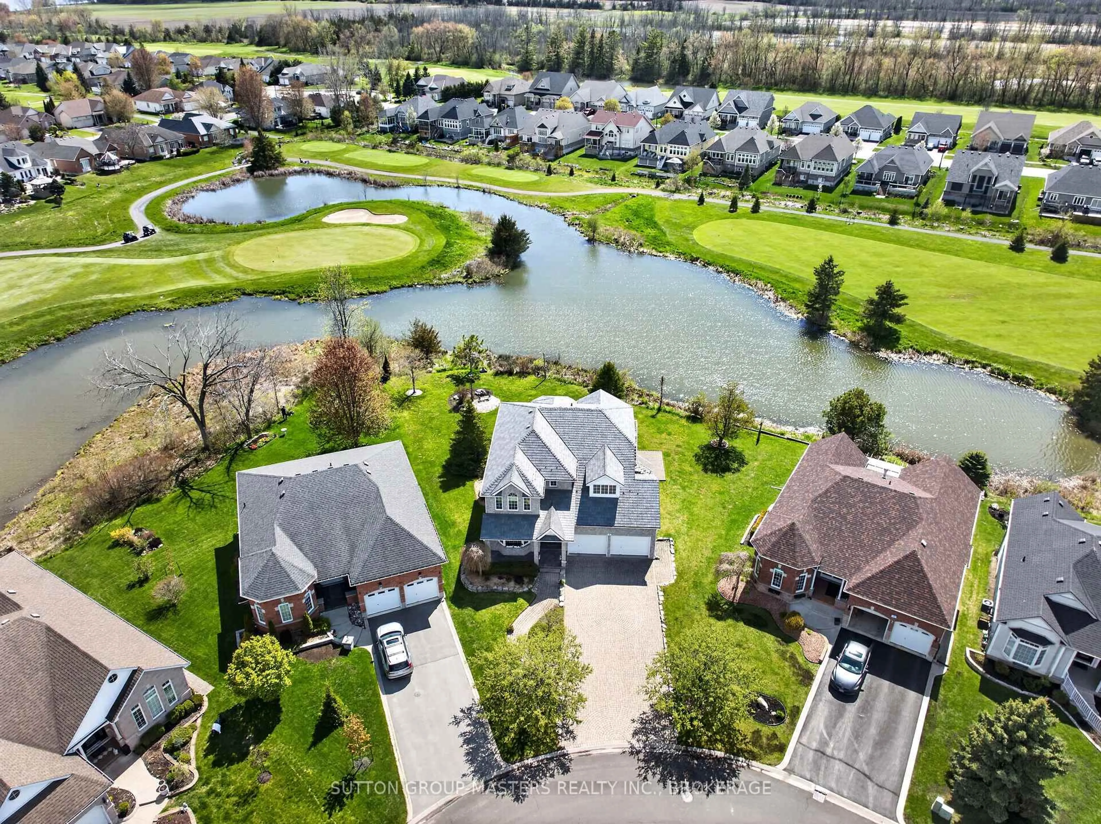 A pic from outside/outdoor area/front of a property/back of a property/a pic from drone, water/lake/river/ocean view for 36 Glenora Dr, Bath Ontario K0H 1G0