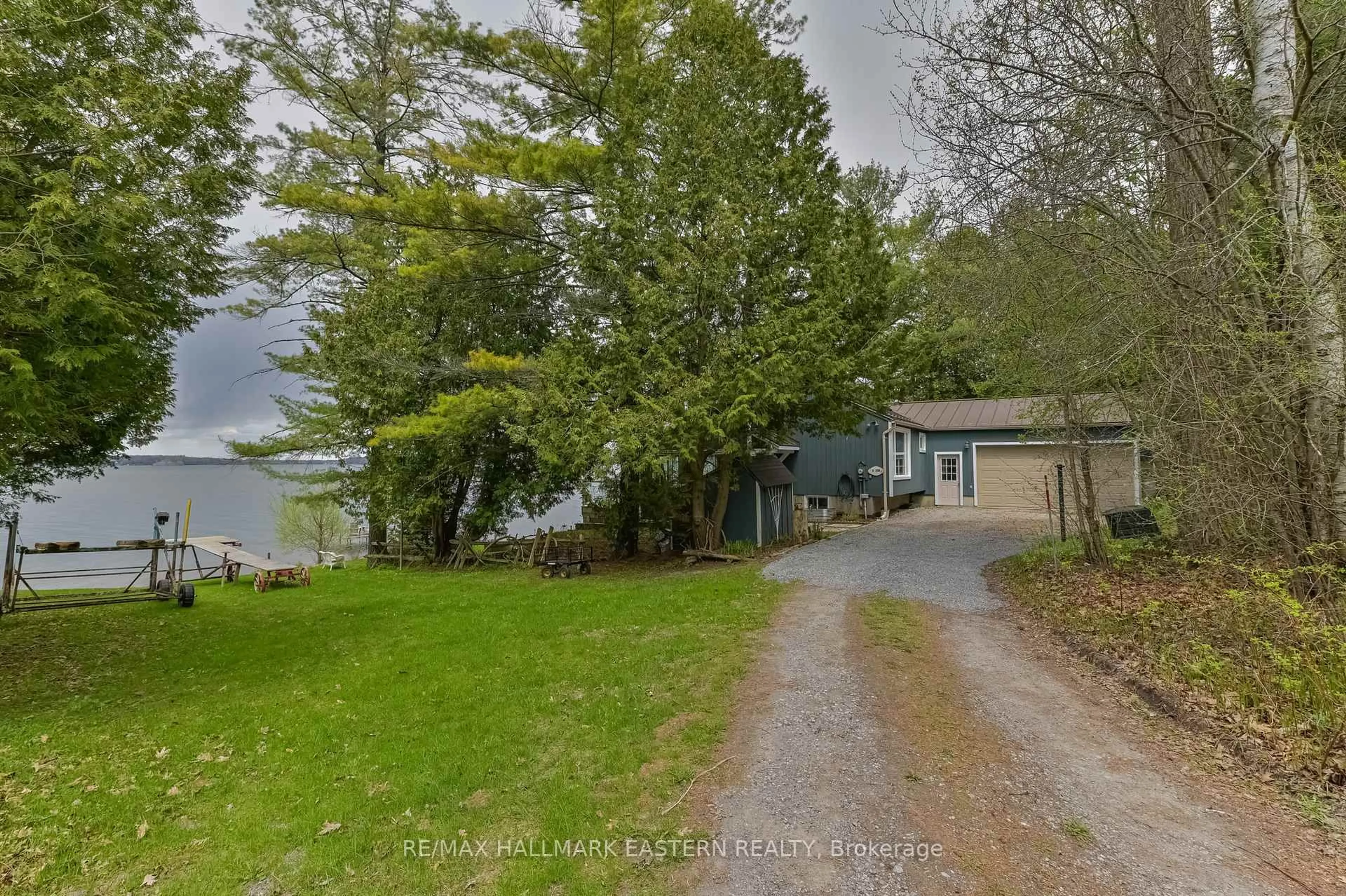 A pic from outside/outdoor area/front of a property/back of a property/a pic from drone, water/lake/river/ocean view for 8018 Taits Beach Rd ##200, Hamilton Township Ontario K0L 1E0