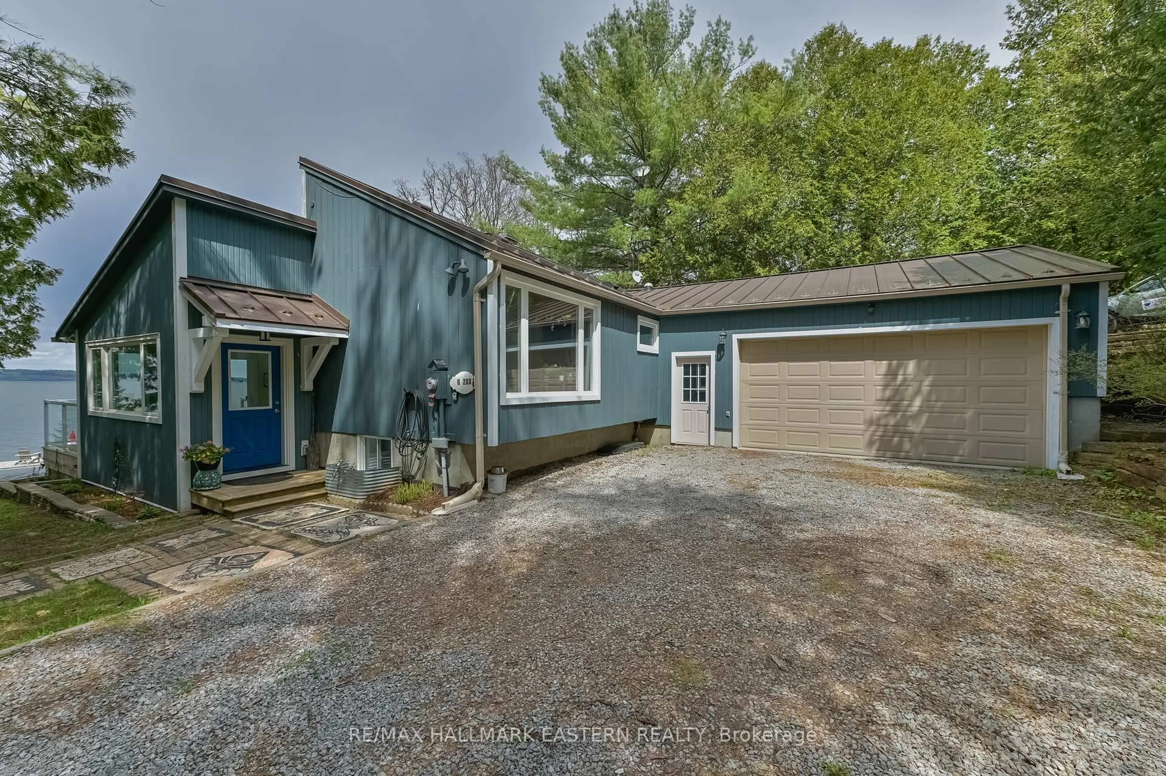 A pic from outside/outdoor area/front of a property/back of a property/a pic from drone, street for 8018 Taits Beach Rd ##200, Hamilton Township Ontario K0L 1E0