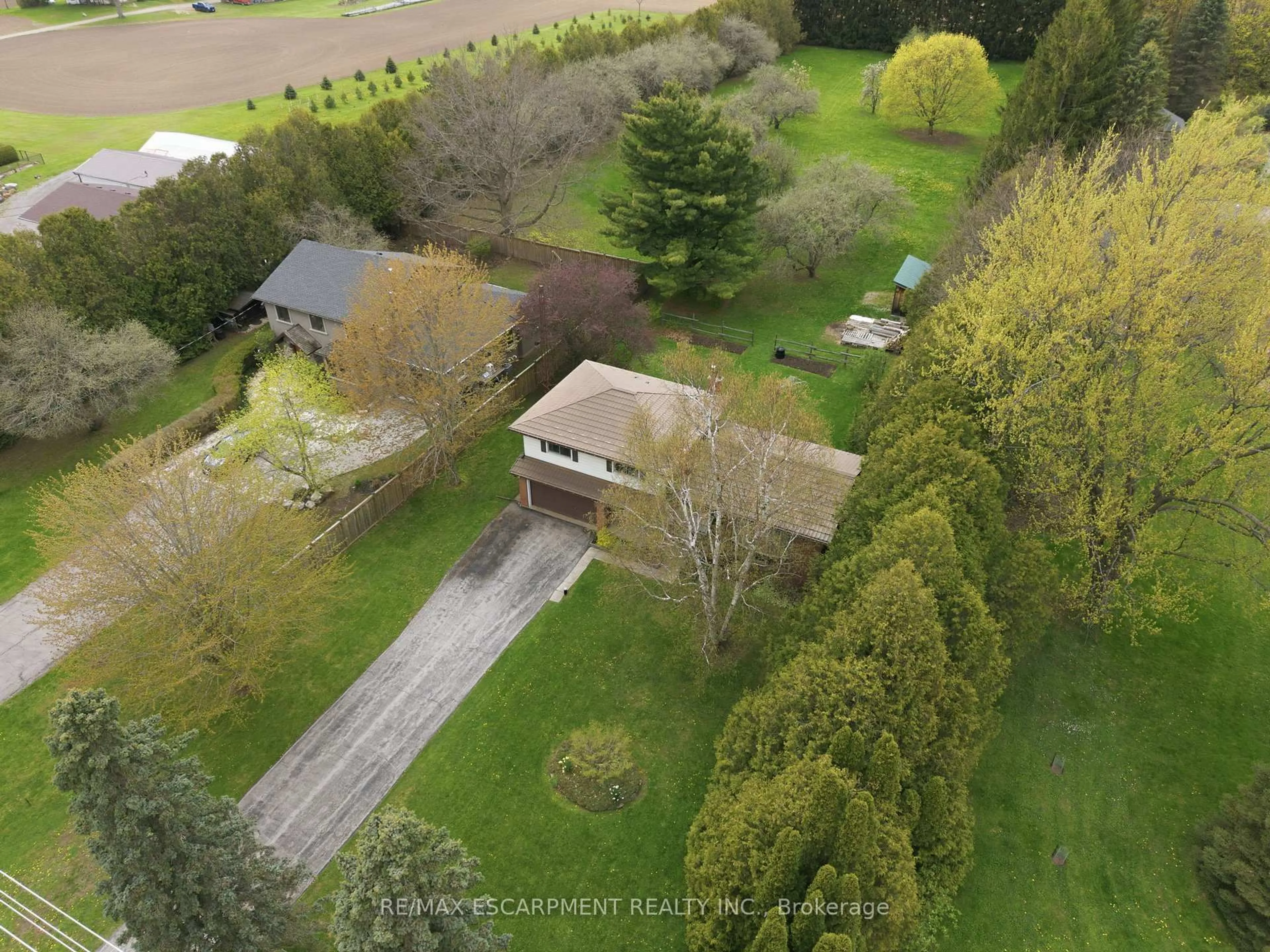 A pic from outside/outdoor area/front of a property/back of a property/a pic from drone, forest/trees view for 175 Concession 5, Hamilton Ontario L8B 1K4