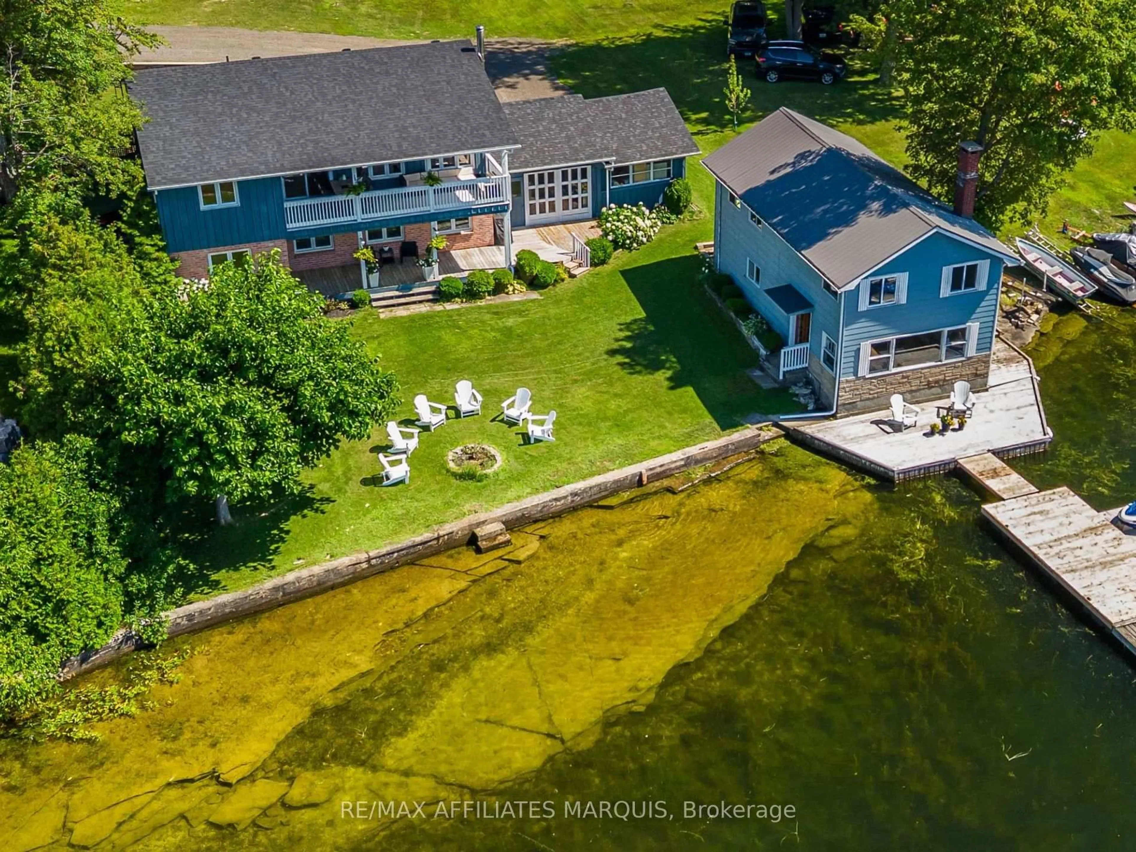 A pic from outside/outdoor area/front of a property/back of a property/a pic from drone, water/lake/river/ocean view for 40 R6 Rd, Rideau Lakes Ontario K0G 1L0