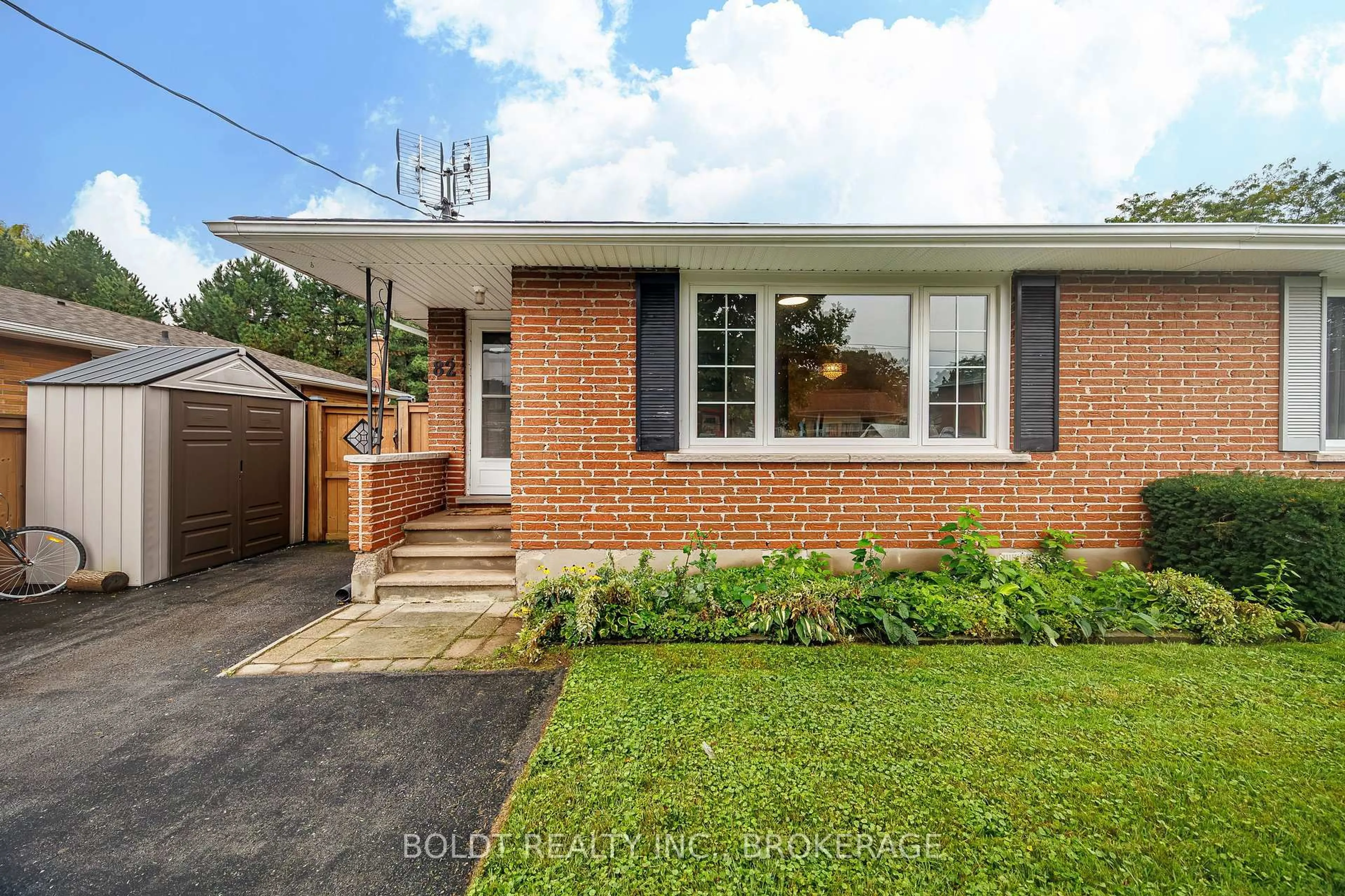 Home with brick exterior material, street for 82 Wildwood Rd, St. Catharines Ontario L2M 1C8