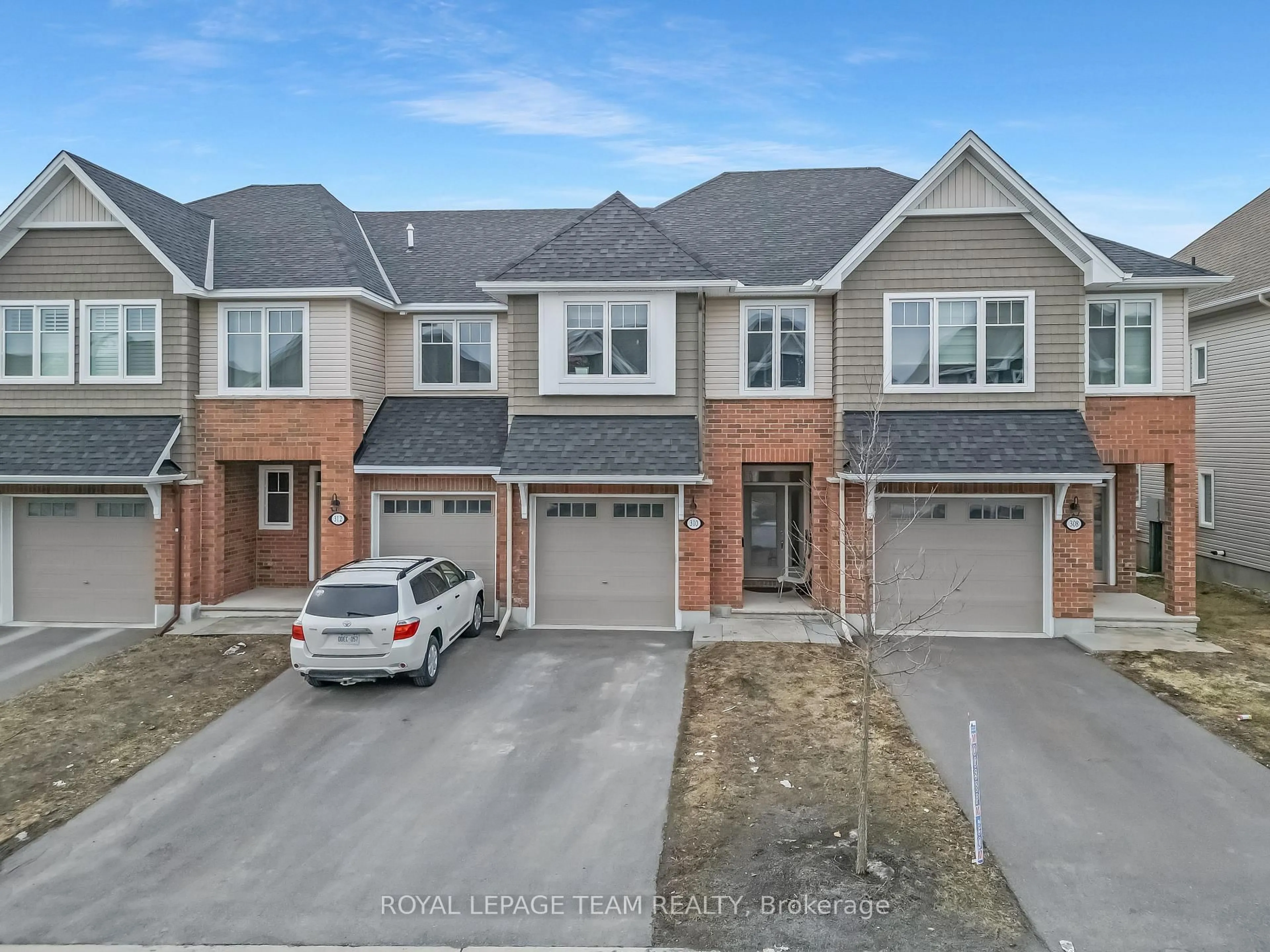 A pic from outside/outdoor area/front of a property/back of a property/a pic from drone, street for 310 Kanashtage Terr, Ottawa Ontario K4A 5J9