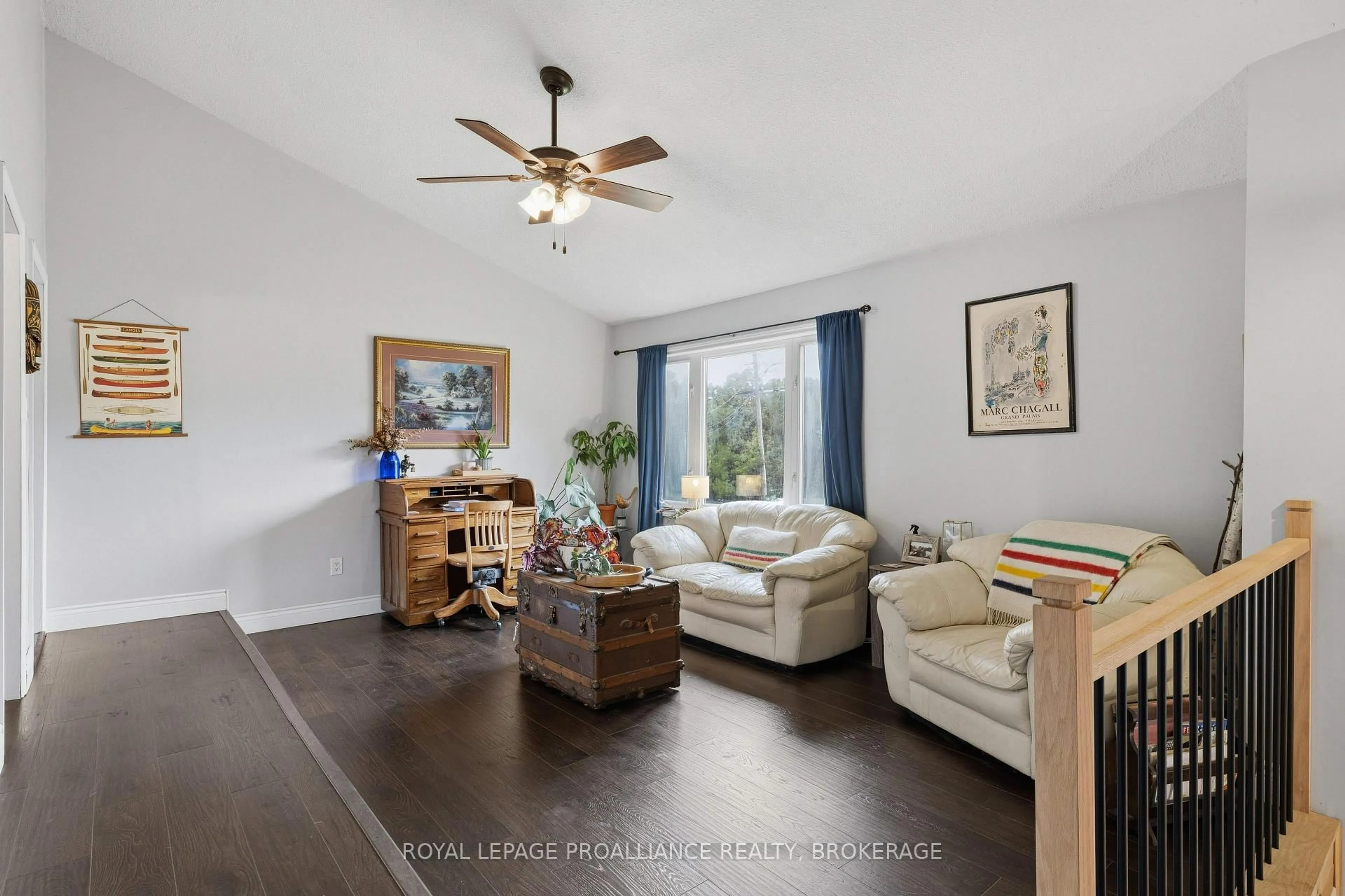 Living room with furniture, wood/laminate floor for 4018 County Road 1, Yarker Ontario K0K 3N0