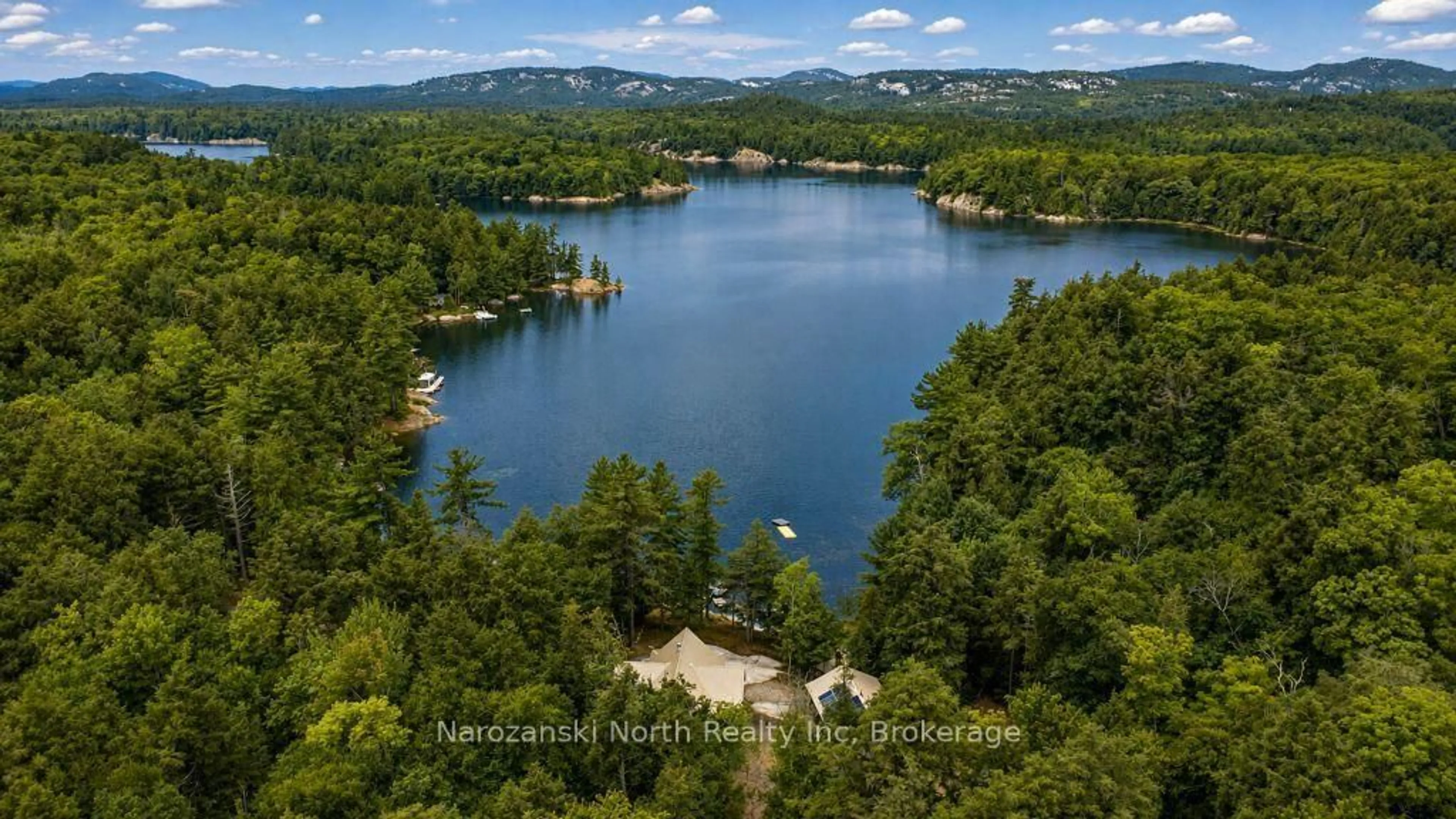 A pic from outside/outdoor area/front of a property/back of a property/a pic from drone, water/lake/river/ocean view for 836 J carlyle lake Rd, Killarney Ontario P0M 2A0