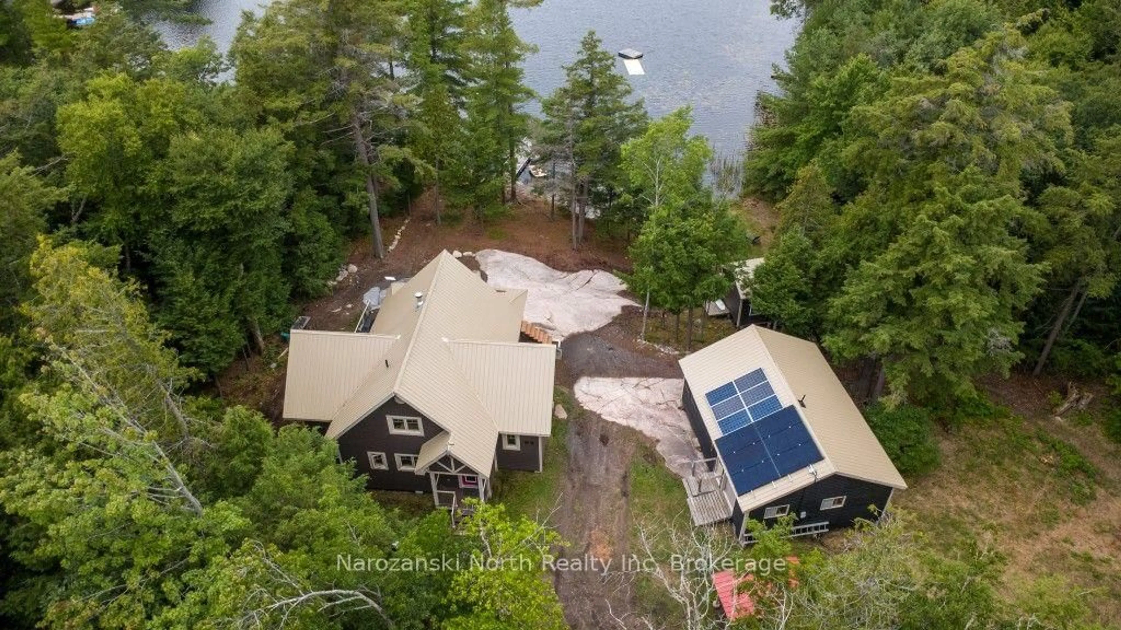 A pic from outside/outdoor area/front of a property/back of a property/a pic from drone, water/lake/river/ocean view for 836 J carlyle lake Rd, Killarney Ontario P0M 2A0