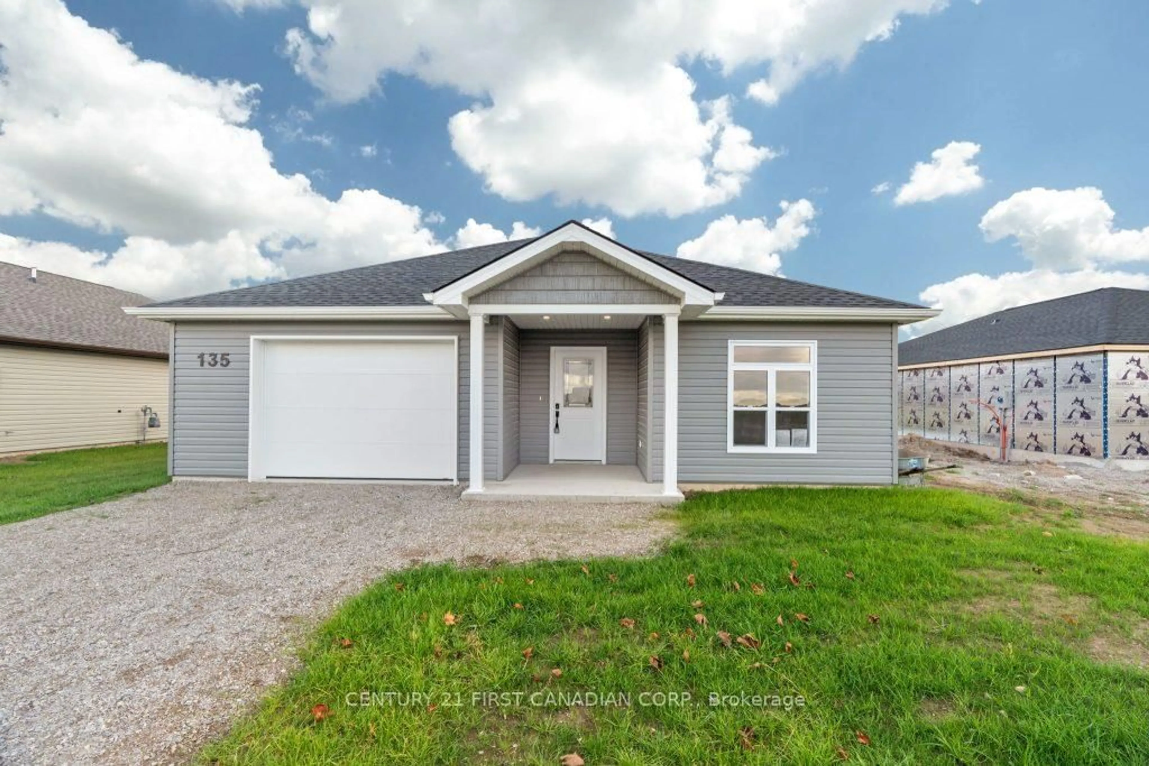 Home with vinyl exterior material, street for 91 Victoria Ave, South Huron Ontario N0M 1M0