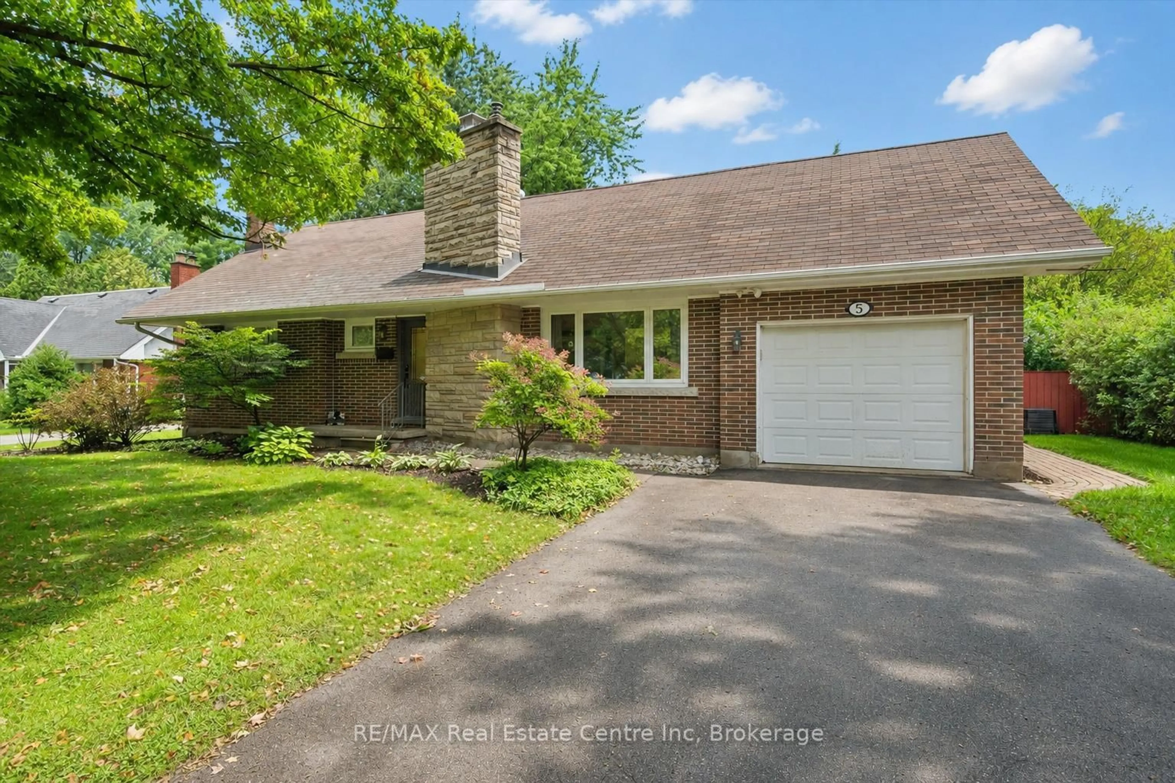 Home with brick exterior material, street for 5 TAMARACK Pl, Guelph Ontario N1E 3Y5