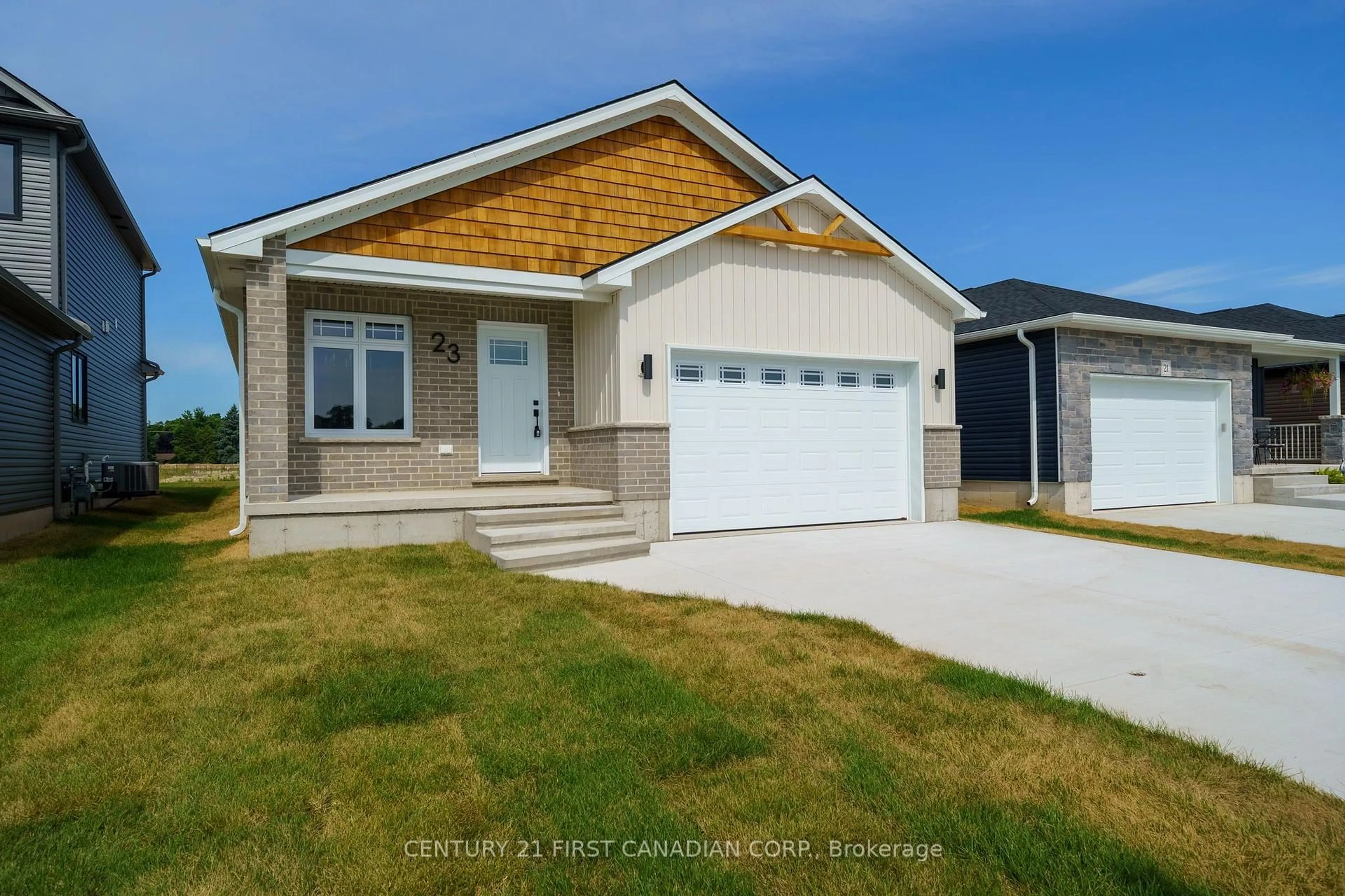 Home with vinyl exterior material, street for 107 Victoria Ave, South Huron Ontario N0M 1M0