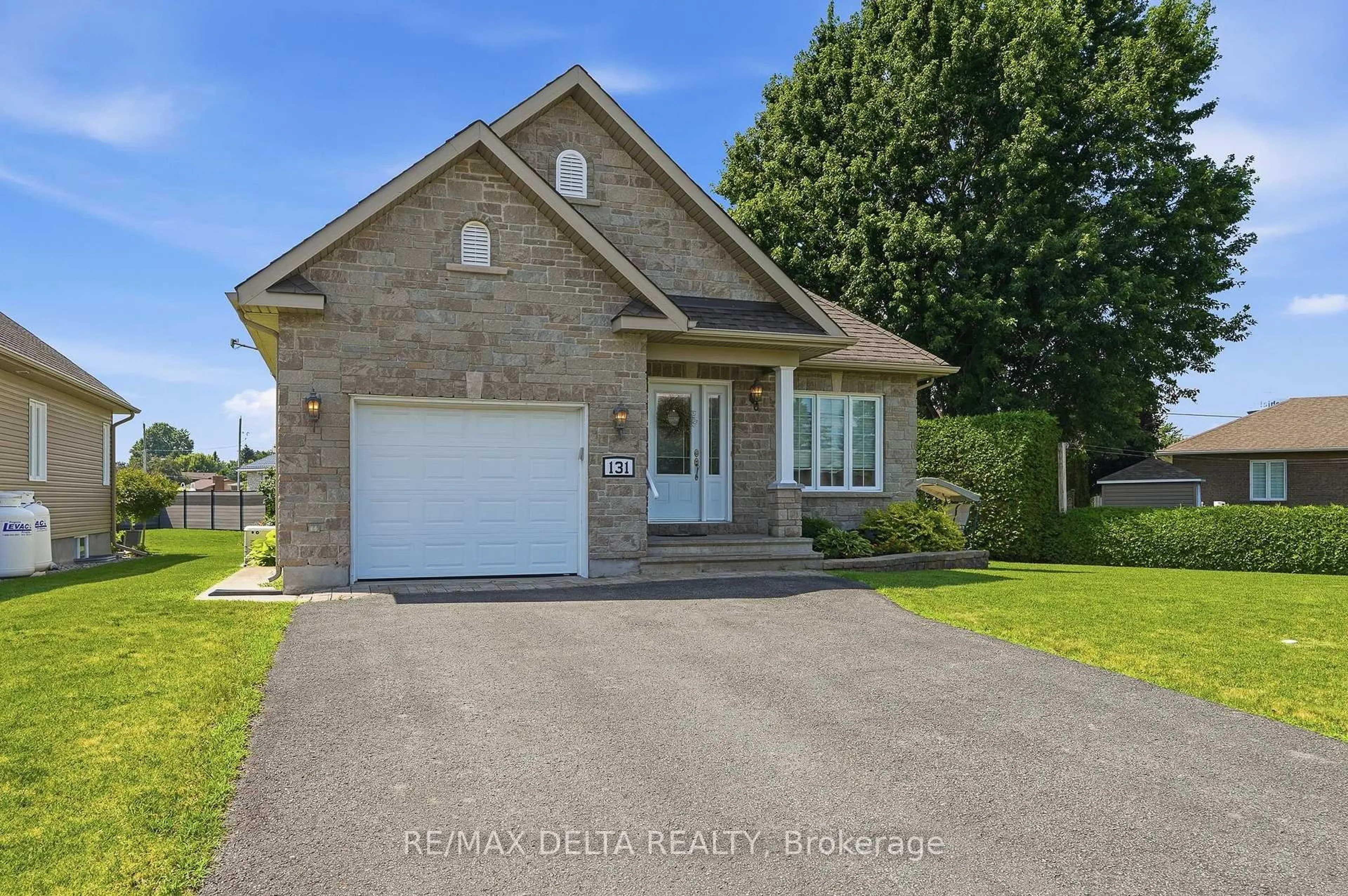 Home with brick exterior material, street for 131 Caledonia Rd, The Nation Ontario K0C 2B0