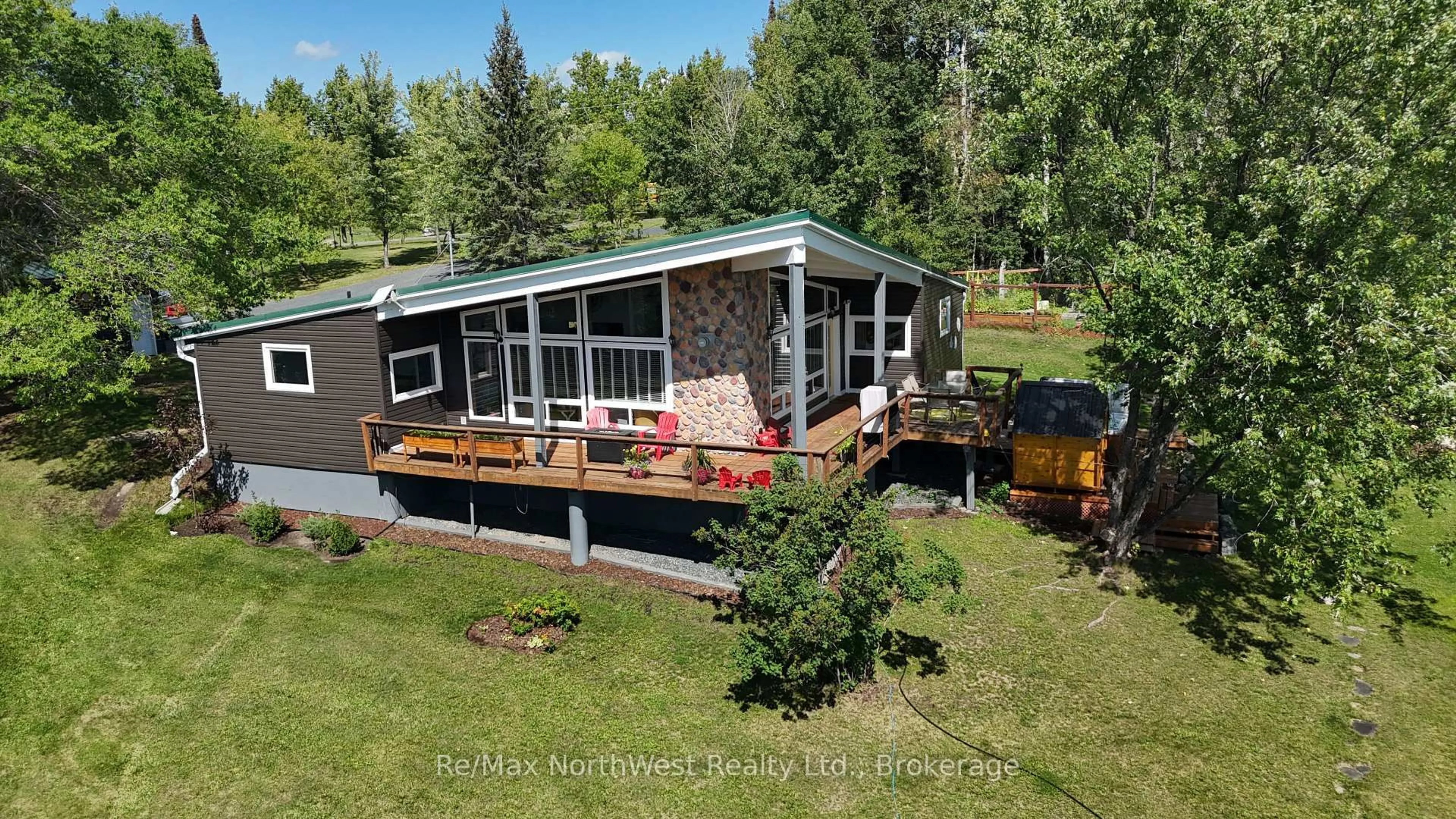 A pic from outside/outdoor area/front of a property/back of a property/a pic from drone, water/lake/river/ocean view for 6 Chrustie Rd, Kenora Remote Area Ontario P0X 1C0