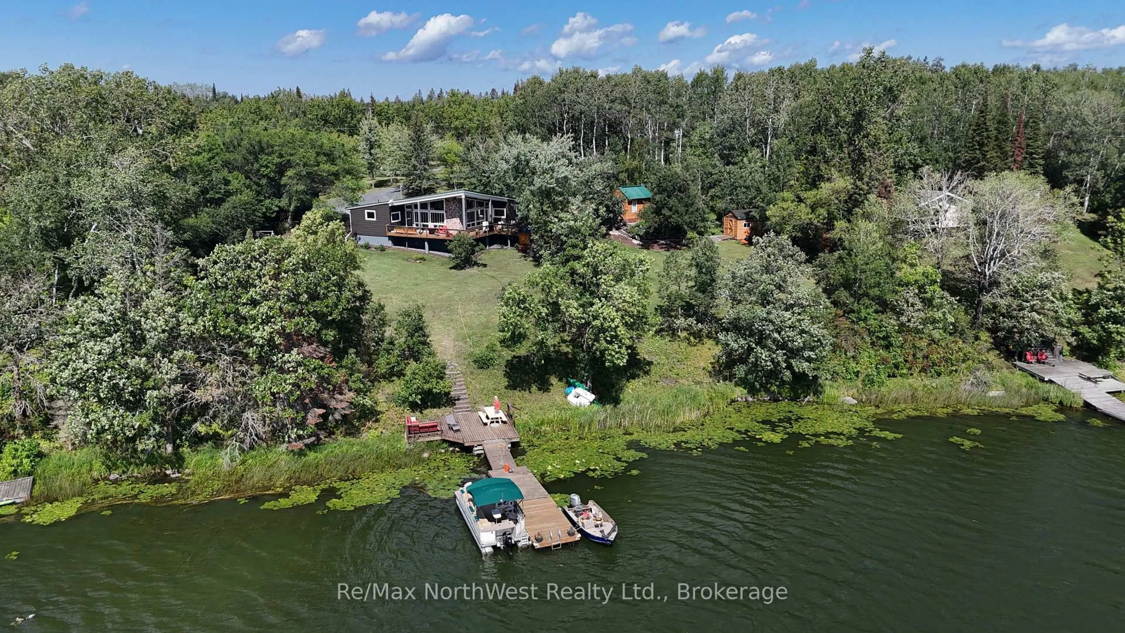 A pic from outside/outdoor area/front of a property/back of a property/a pic from drone, water/lake/river/ocean view for 6 Chrustie Rd, Kenora Remote Area Ontario P0X 1C0