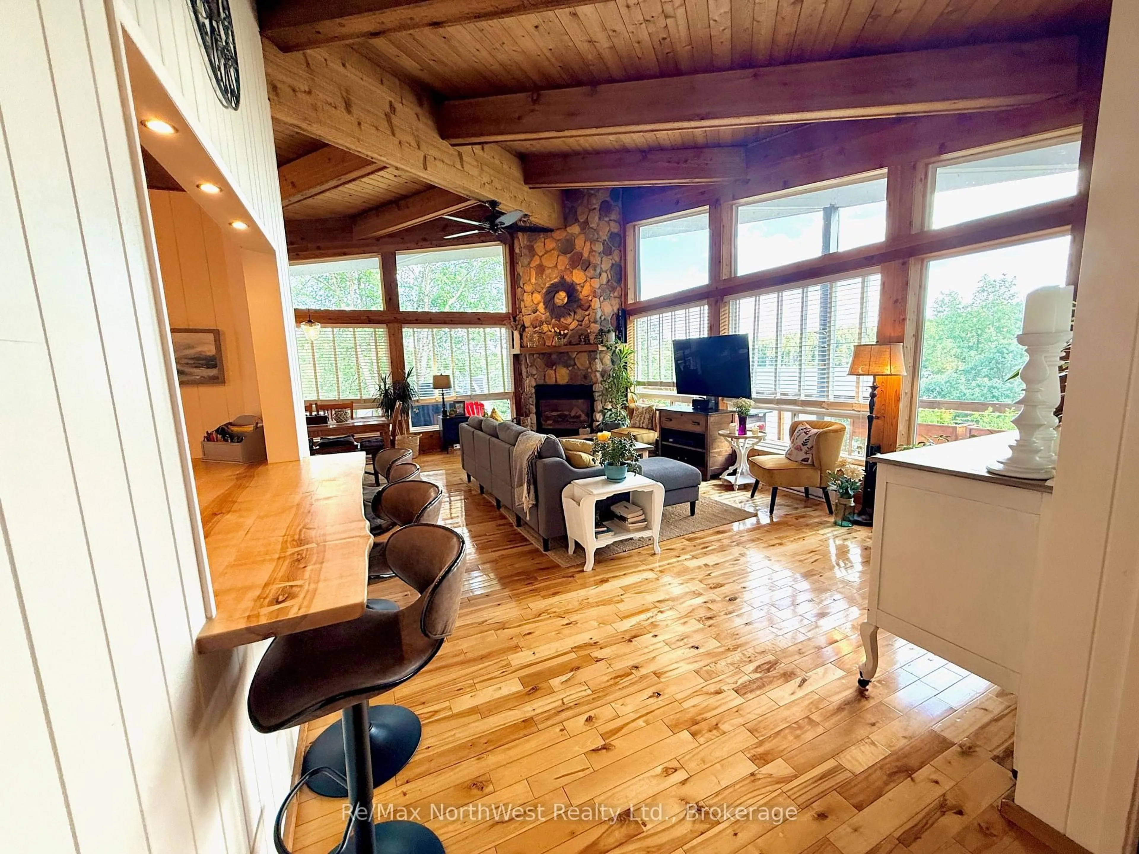 Living room with furniture, wood/laminate floor for 6 Chrustie Rd, Kenora Remote Area Ontario P0X 1C0