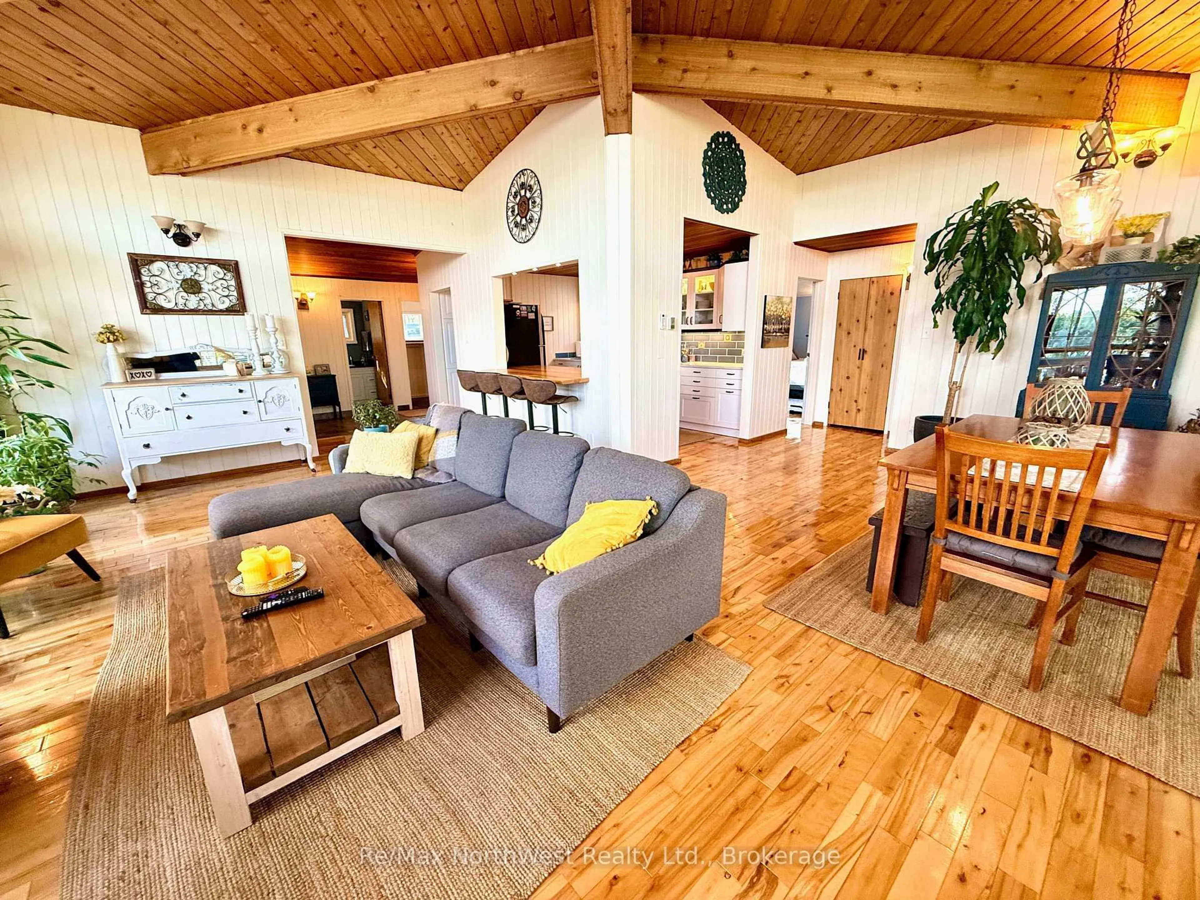 Living room with furniture, wood/laminate floor for 6 Chrustie Rd, Kenora Remote Area Ontario P0X 1C0