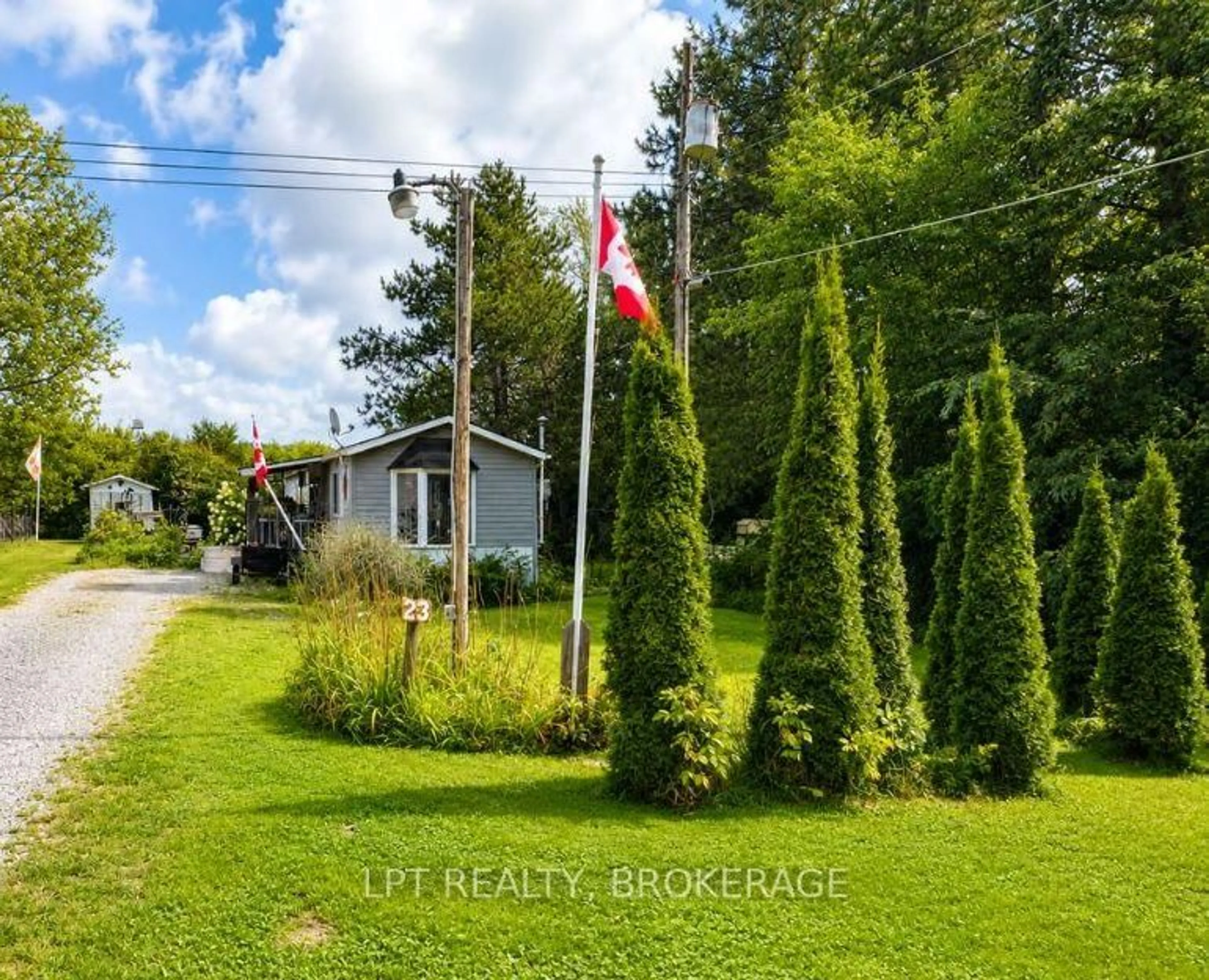A pic from outside/outdoor area/front of a property/back of a property/a pic from drone, unknown for 227 Big Hill Rd #23, Leeds and the Thousand Islands Ontario K0H 2N0