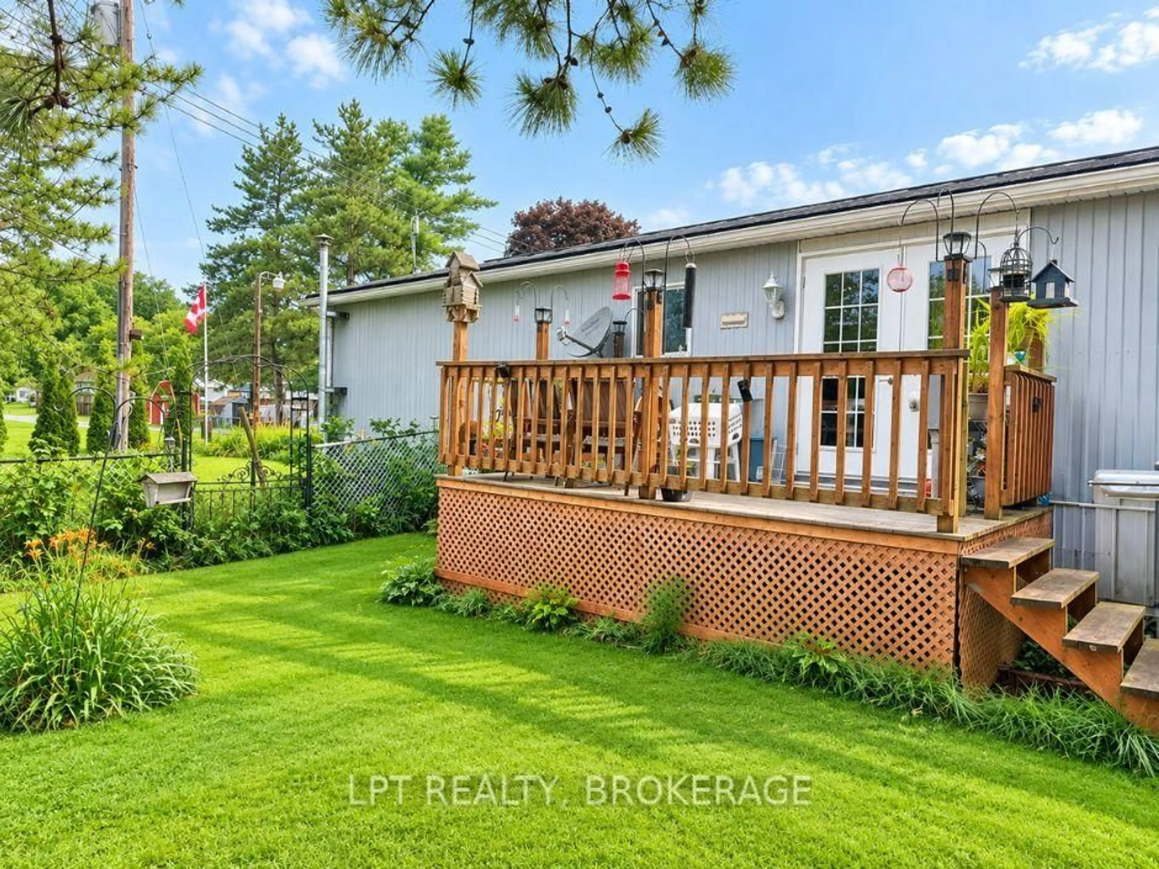 A pic from outside/outdoor area/front of a property/back of a property/a pic from drone, street for 227 Big Hill Rd #23, Leeds and the Thousand Islands Ontario K0H 2N0