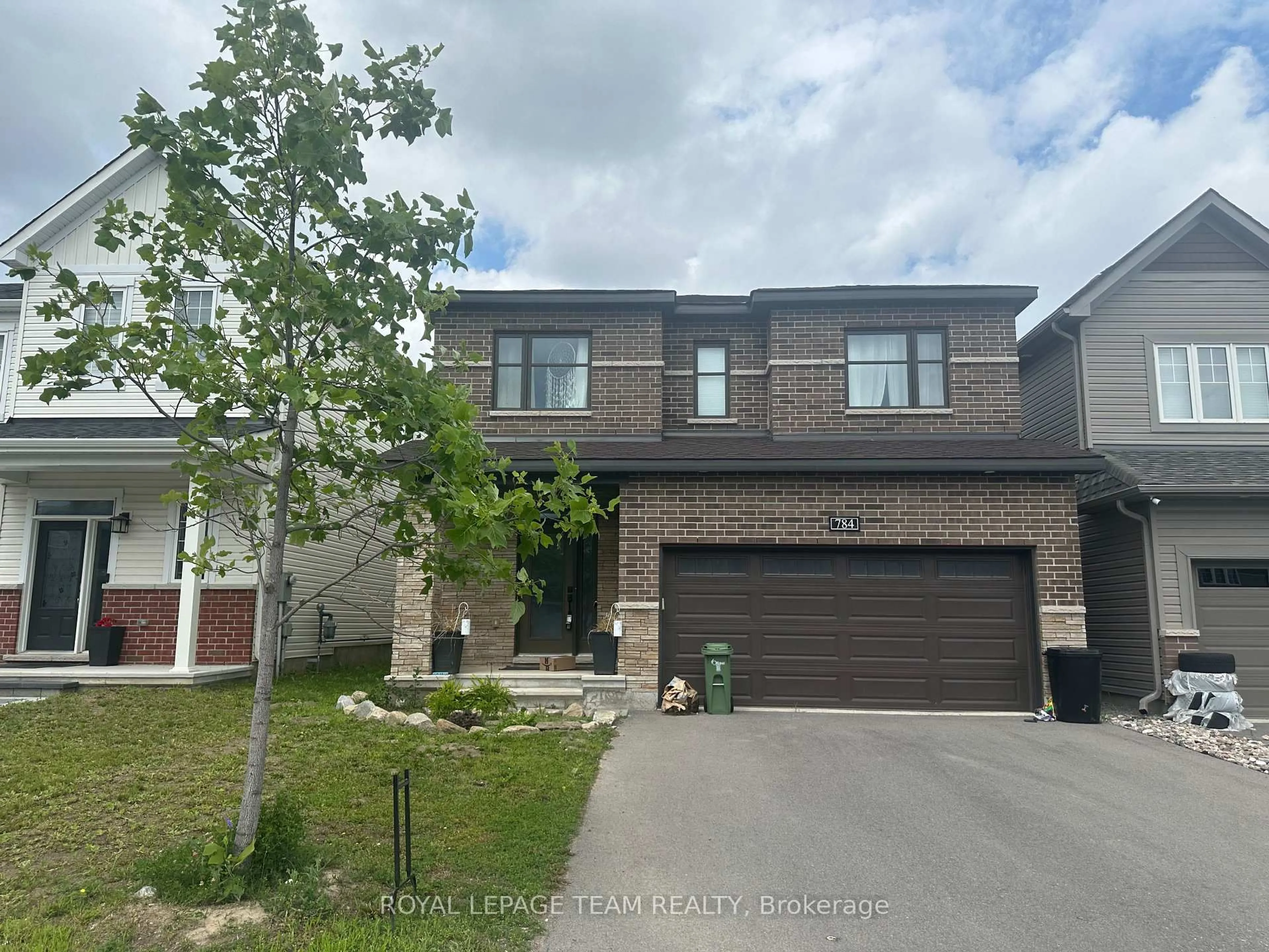 Home with brick exterior material, street for 784 Cappamore Dr, Ottawa Ontario K2J 6V6