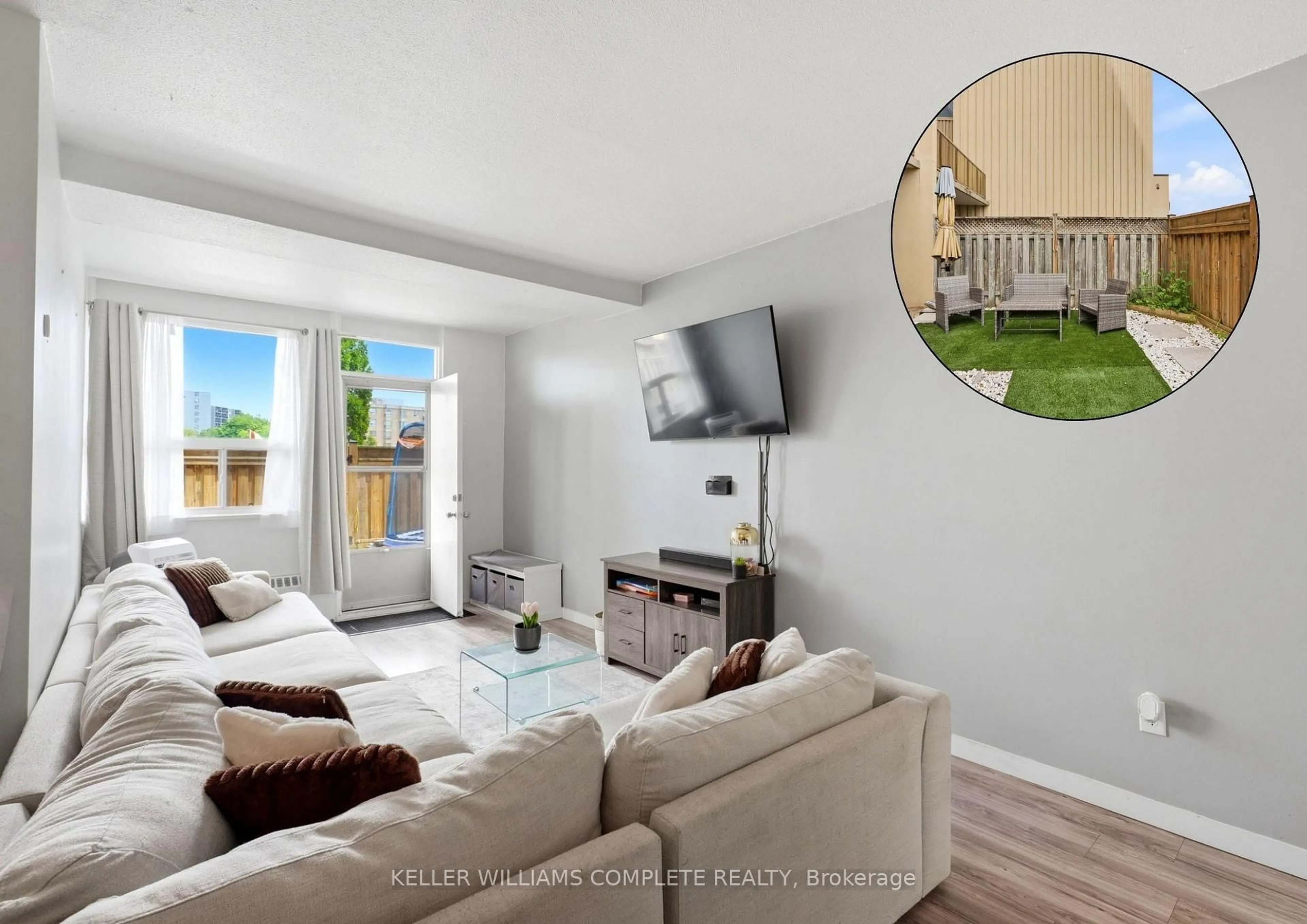Living room with furniture, wood/laminate floor for 15 Nicklaus Dr #17, Hamilton Ontario L8K 5J5