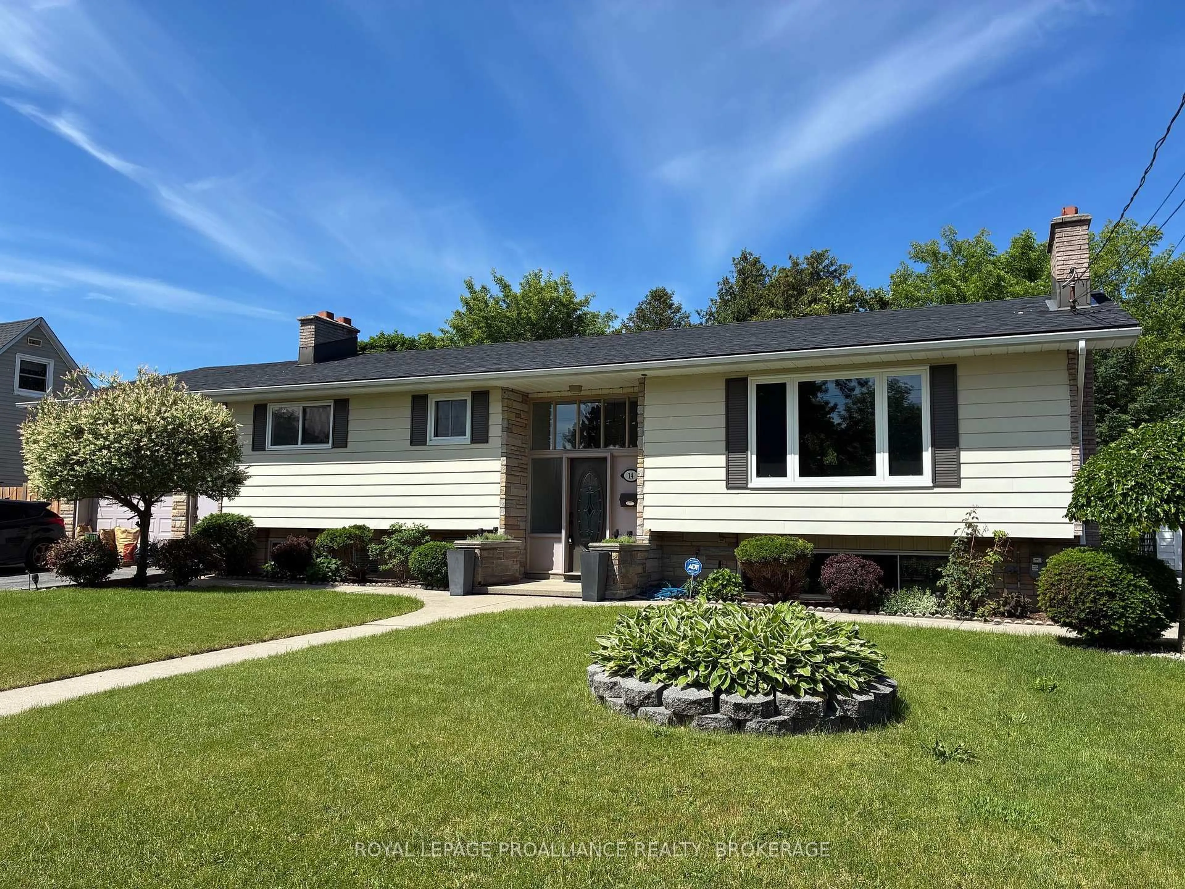 Home with vinyl exterior material, street for 14 Baker St, Kingston Ontario K7K 4Z3