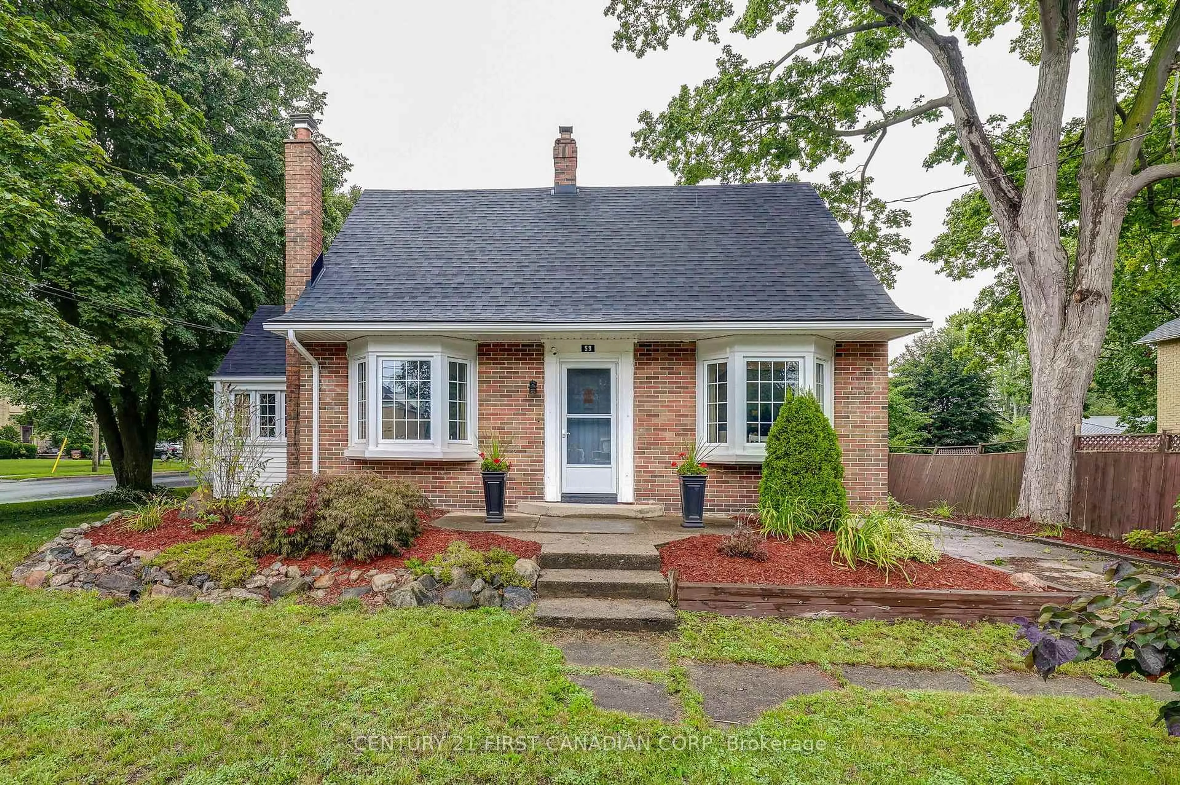 Home with brick exterior material, street for 59 South St, Aylmer Ontario N5H 1R3