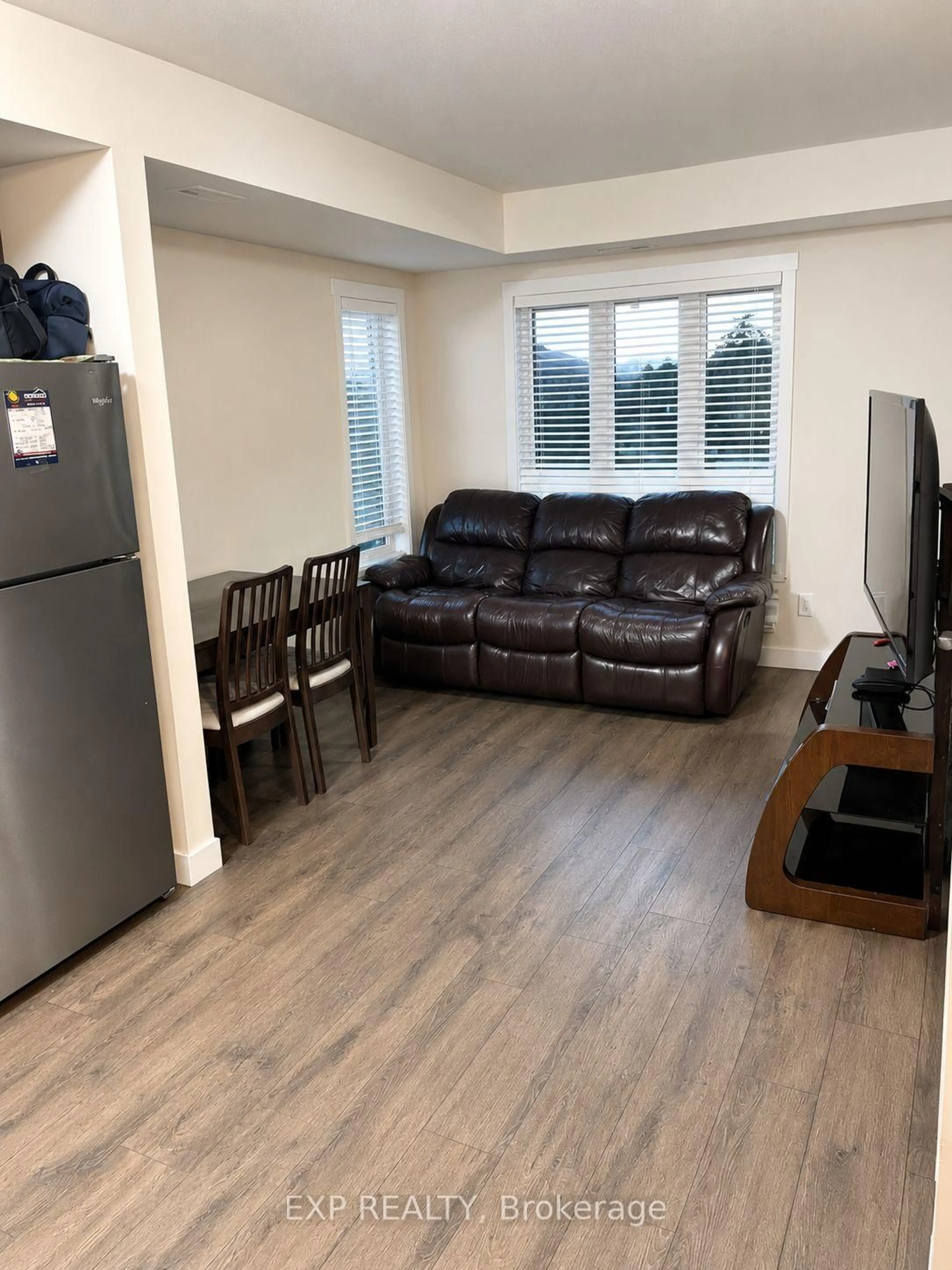 Living room with furniture, wood/laminate floor for 160 ROCHEFORT St #C14, Kitchener Ontario N2R 0P5