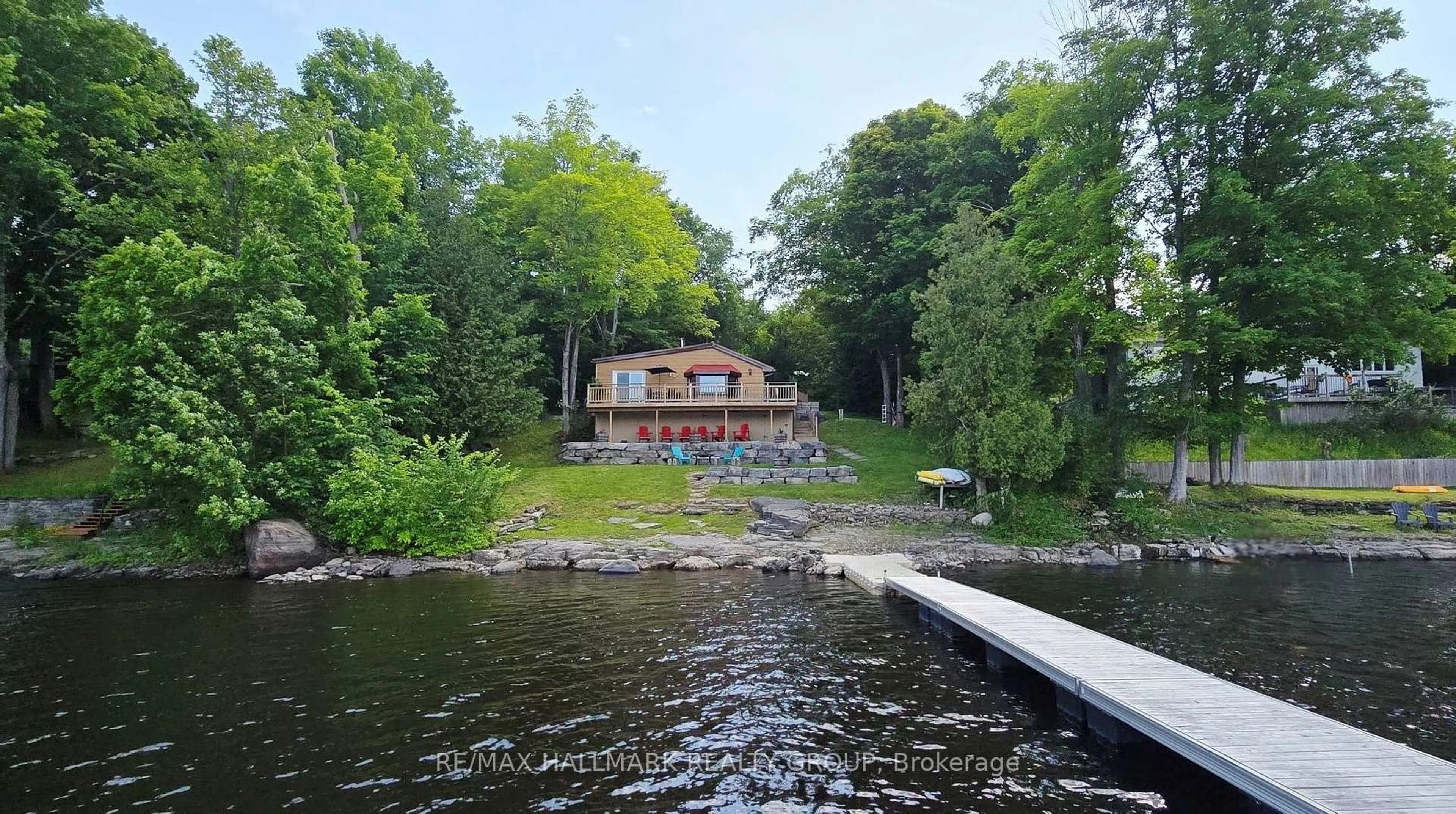 A pic from outside/outdoor area/front of a property/back of a property/a pic from drone, water/lake/river/ocean view for 4614 Northwoods Dr, Ottawa Ontario K0A 3M0