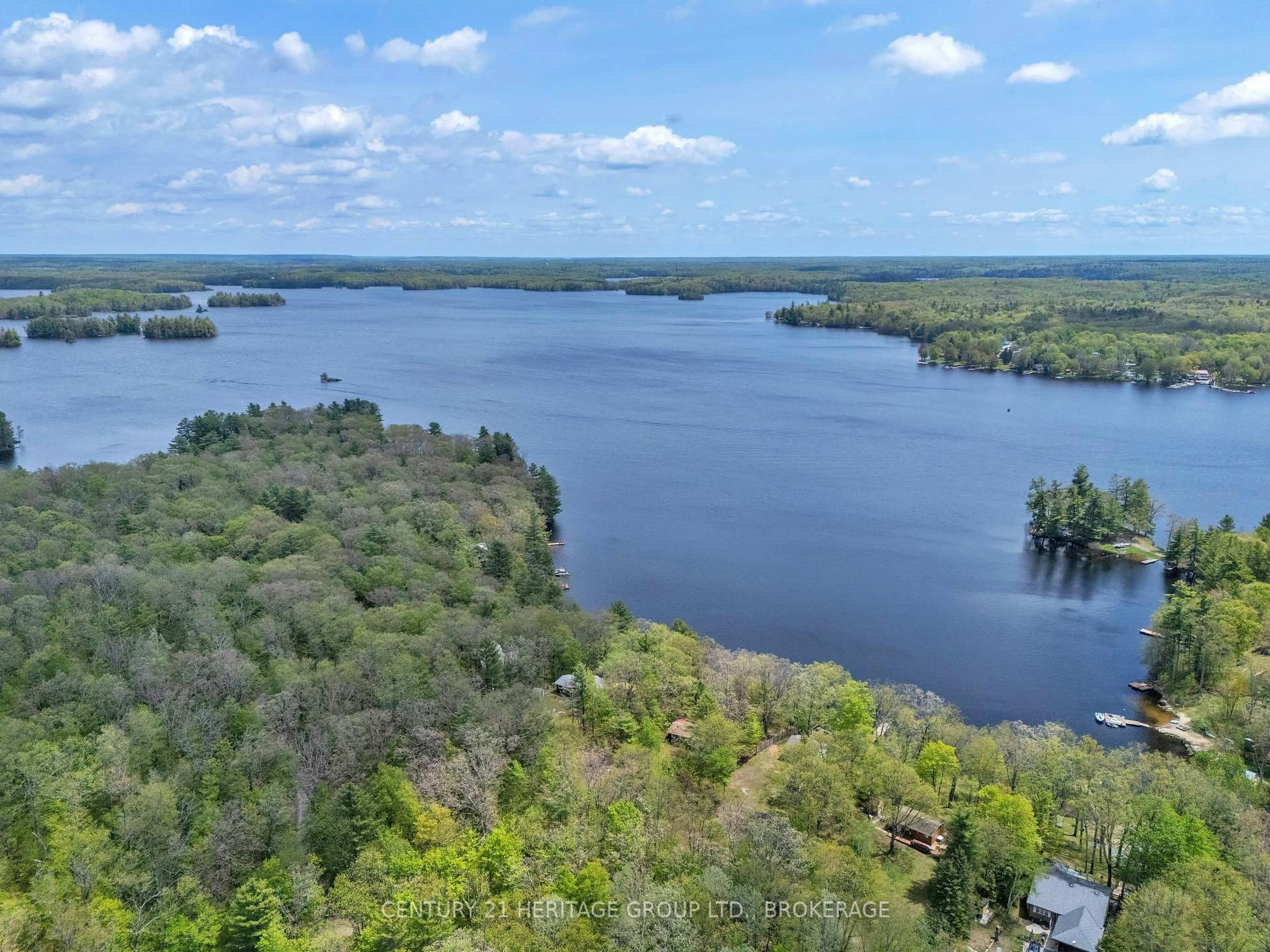 A pic from outside/outdoor area/front of a property/back of a property/a pic from drone, water/lake/river/ocean view for 3 Acorn Lane, Tichborne Ontario K0H 2V0