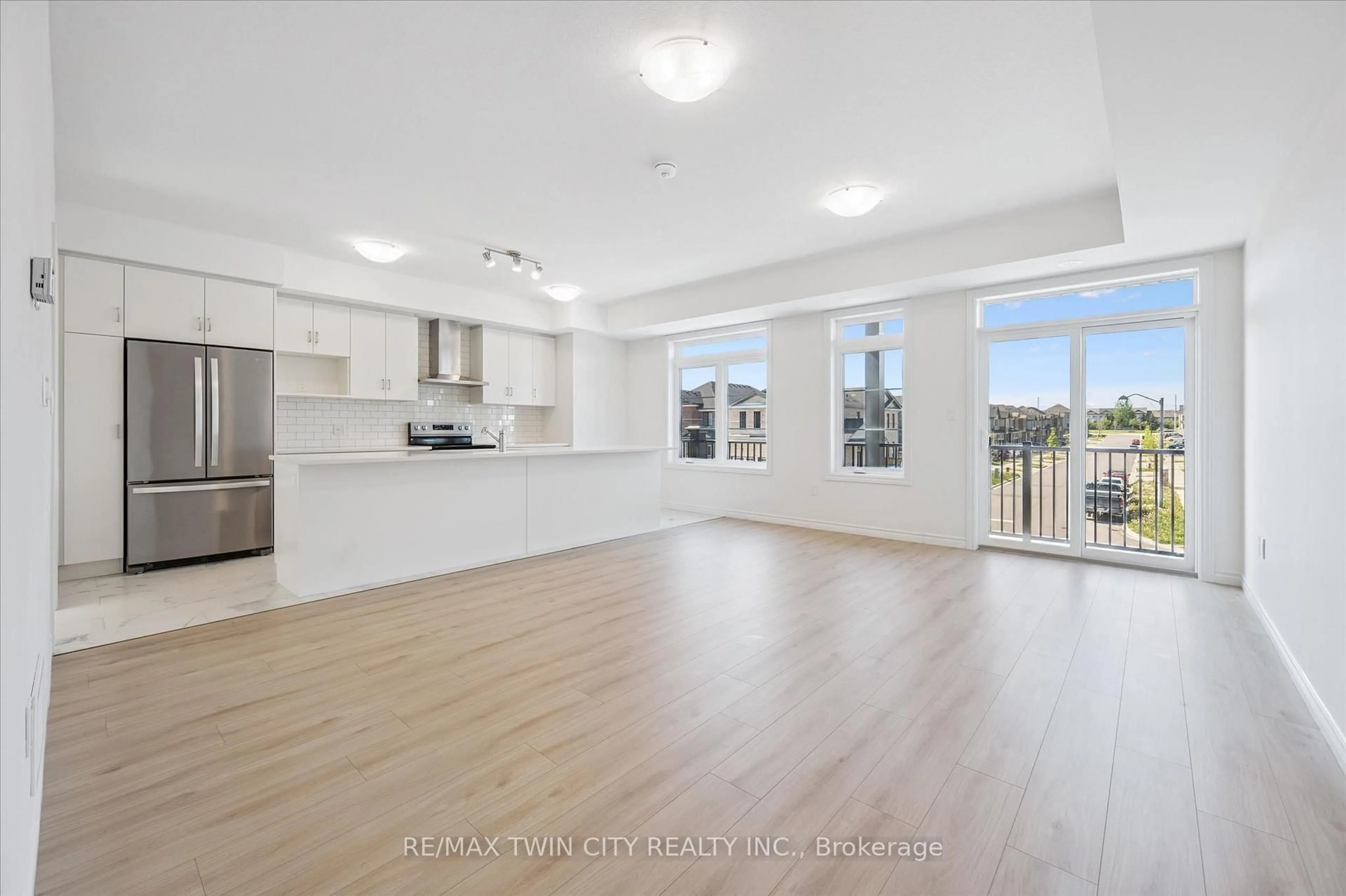Open concept kitchen, wood/laminate floor for 43 Lomond Lane, Kitchener Ontario N2R 0R4