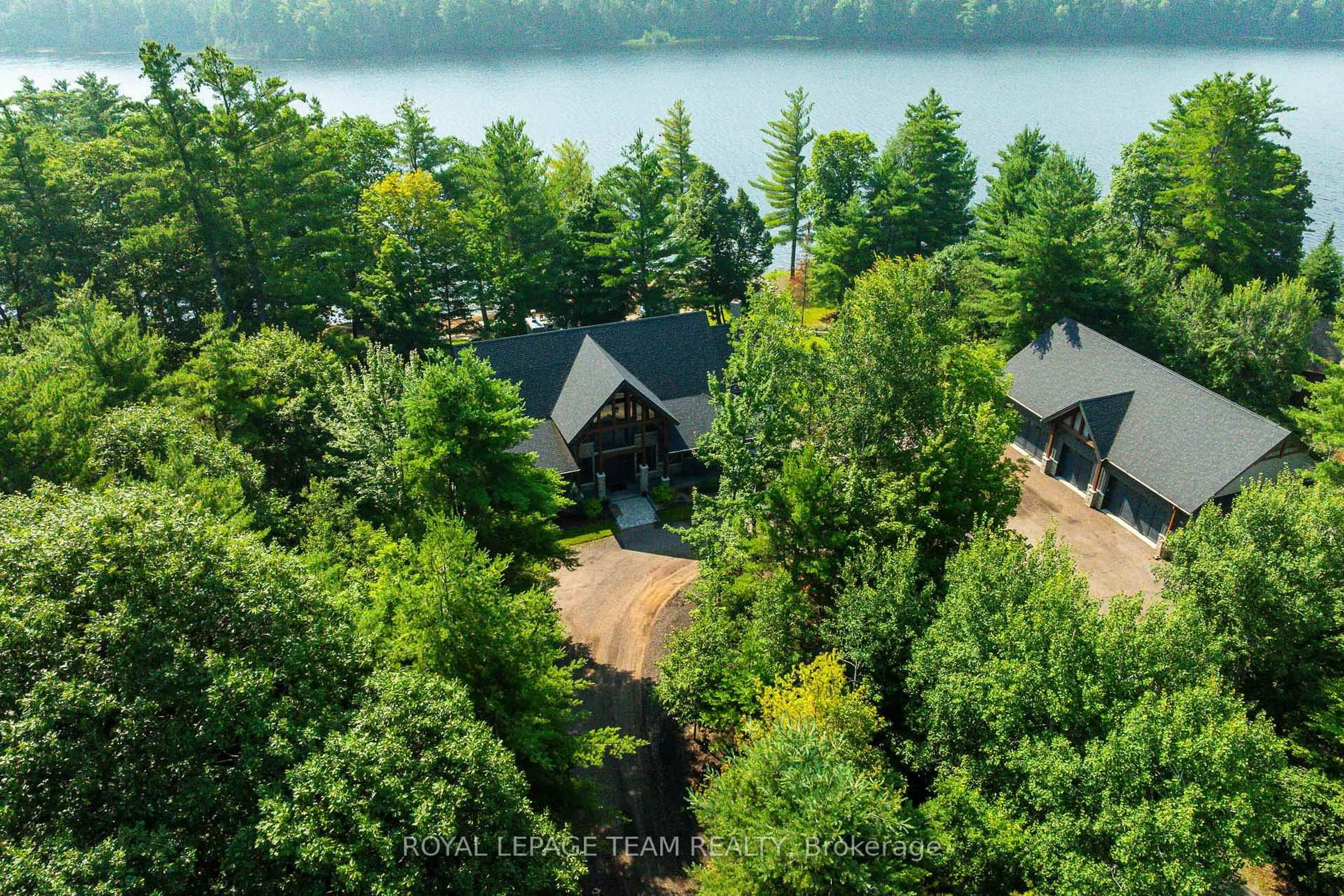 A pic from outside/outdoor area/front of a property/back of a property/a pic from drone, water/lake/river/ocean view for 1173 Barrett Chute Rd, Calabogie Ontario K0J 1H0