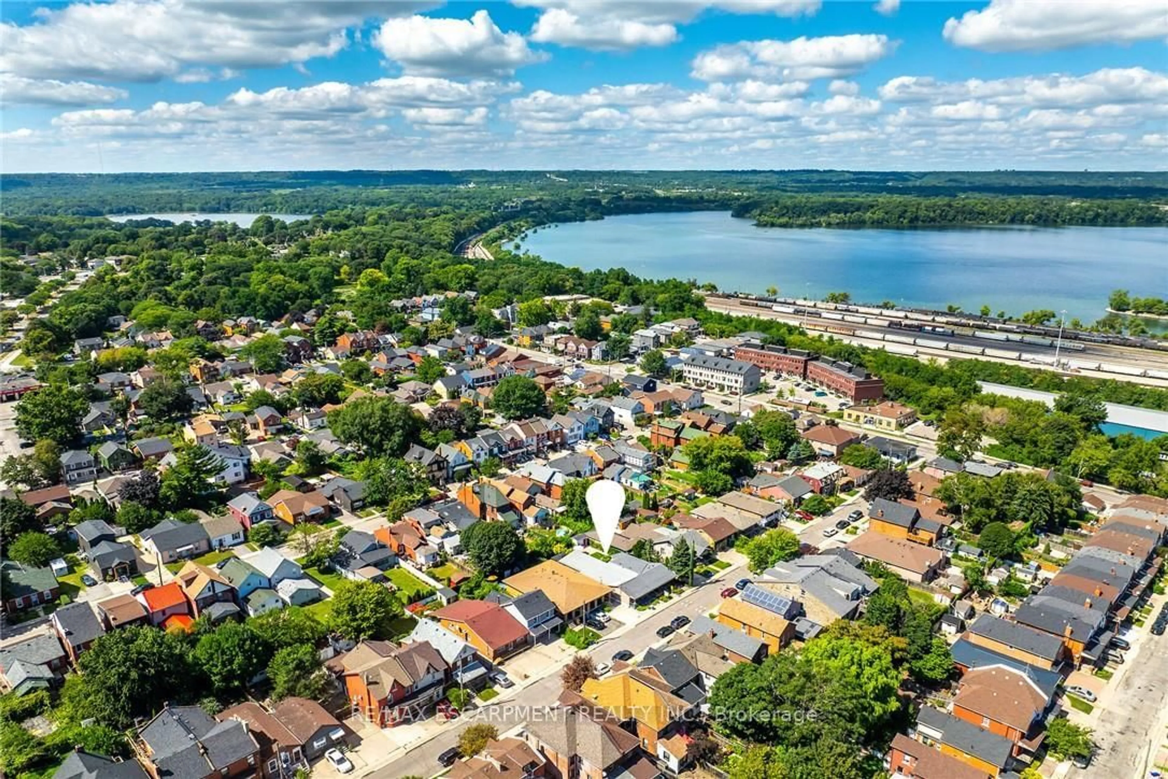 A pic from outside/outdoor area/front of a property/back of a property/a pic from drone, water/lake/river/ocean view for 187 Ray St, Hamilton Ontario L8R 2Y3