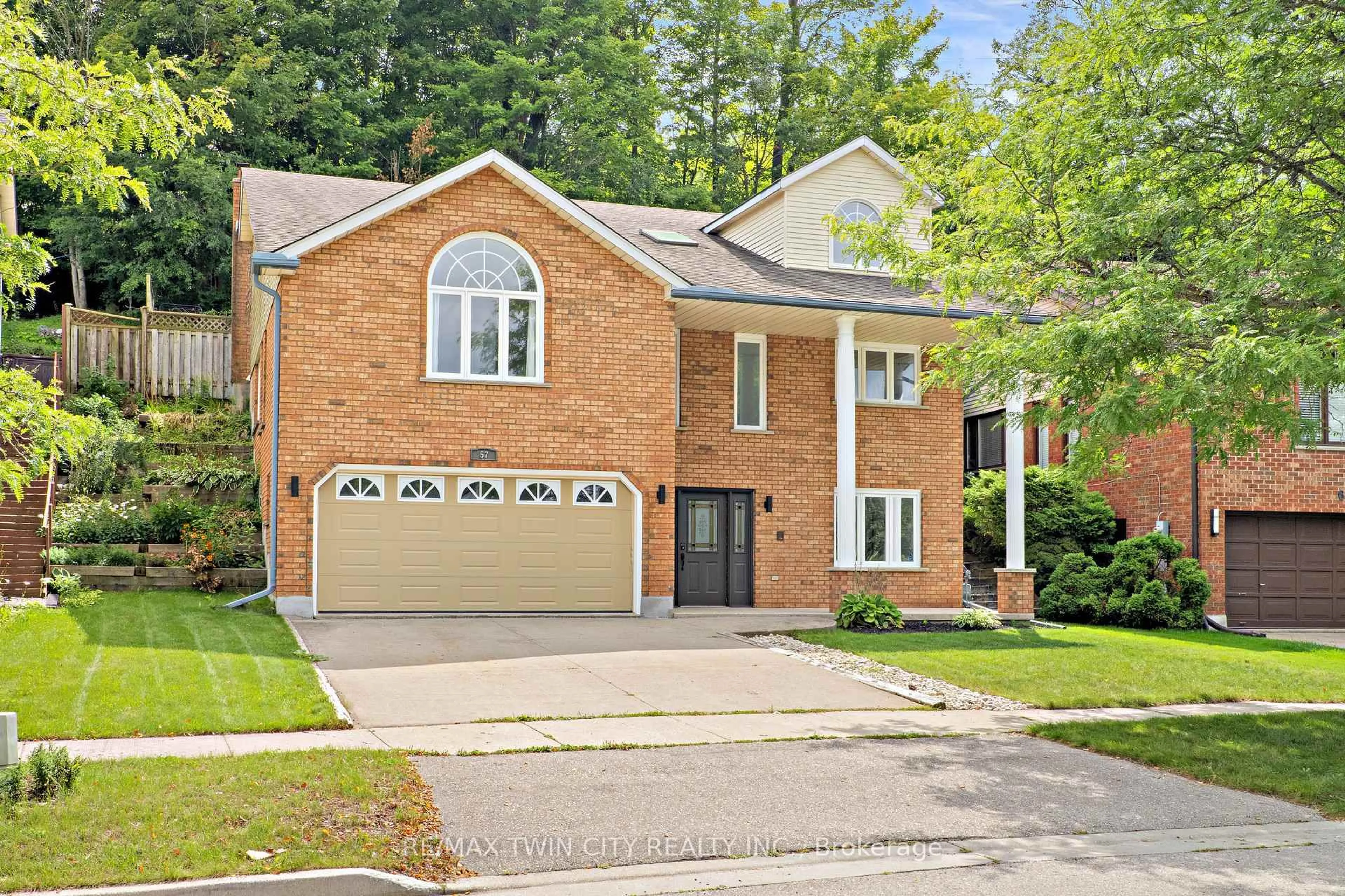 Home with brick exterior material, street for 57 Yellow Birch Dr, Kitchener Ontario N2N 2M3
