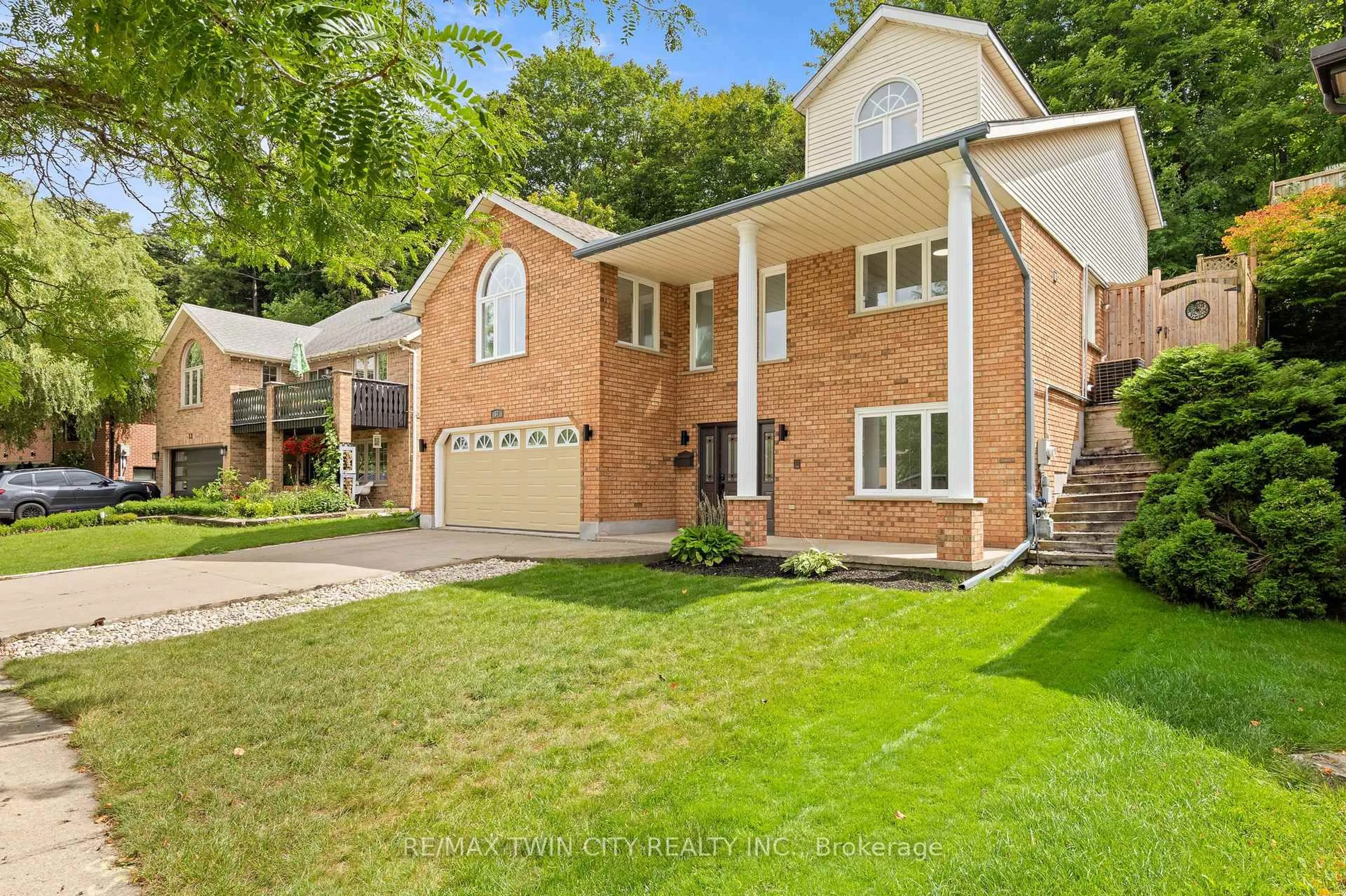 Home with brick exterior material, street for 57 Yellow Birch Dr, Kitchener Ontario N2N 2M3