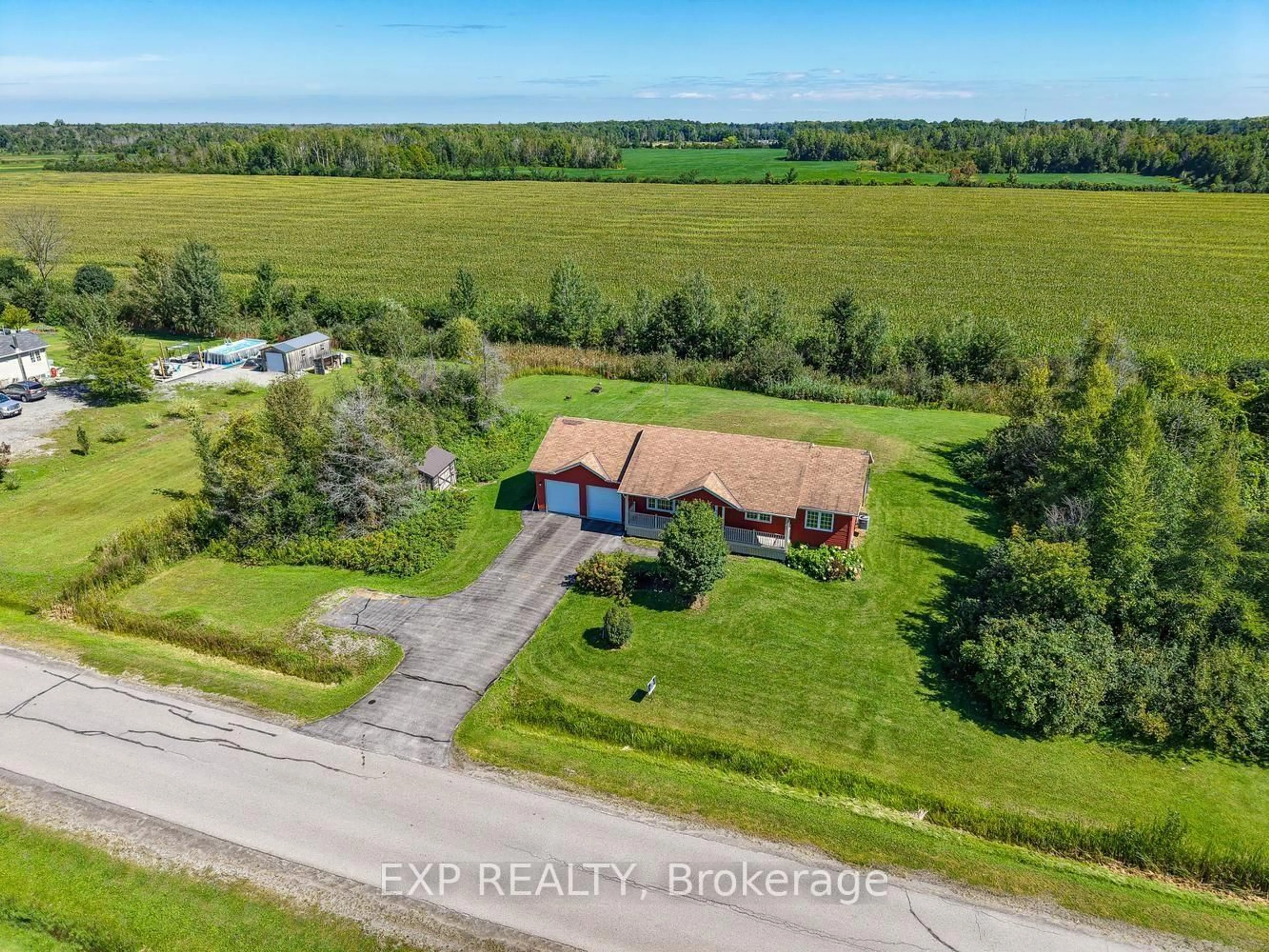 A pic from outside/outdoor area/front of a property/back of a property/a pic from drone, water/lake/river/ocean view for 23 Tamarack Circ, North Grenville Ontario K0G 1J0