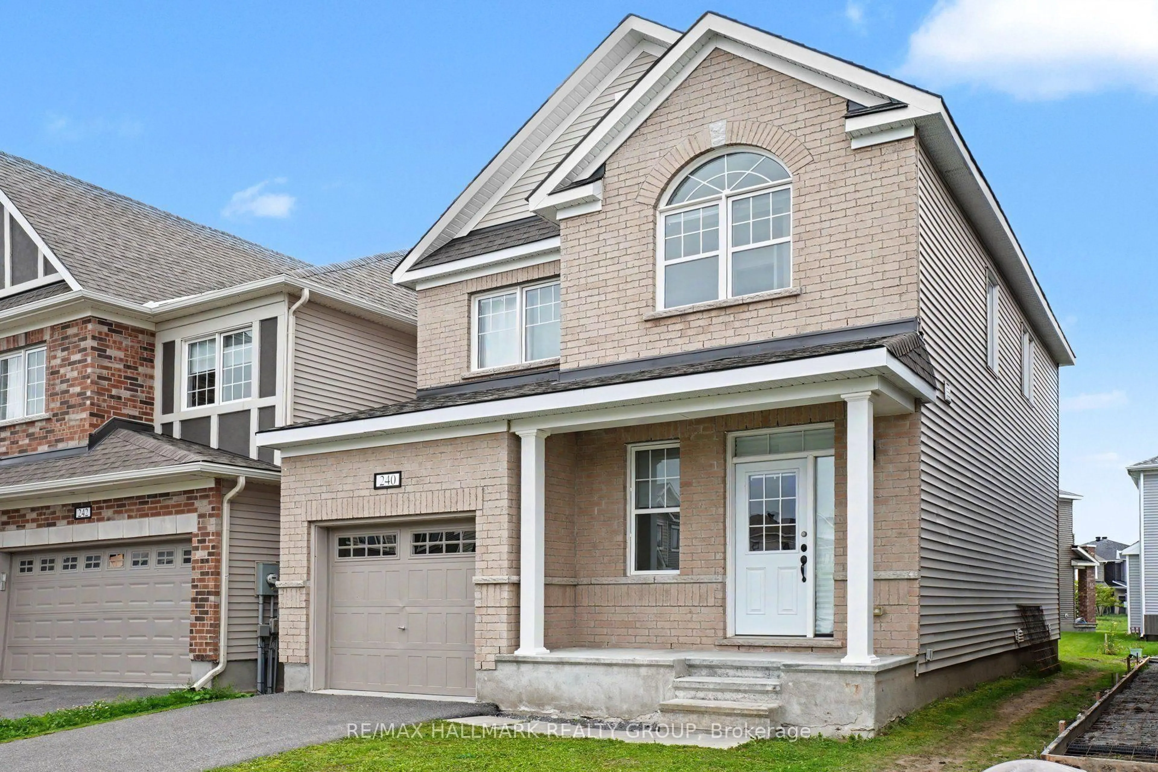 Home with brick exterior material, street for 240 Sweetvalley Dr, Orleans Ontario K4A 5J1