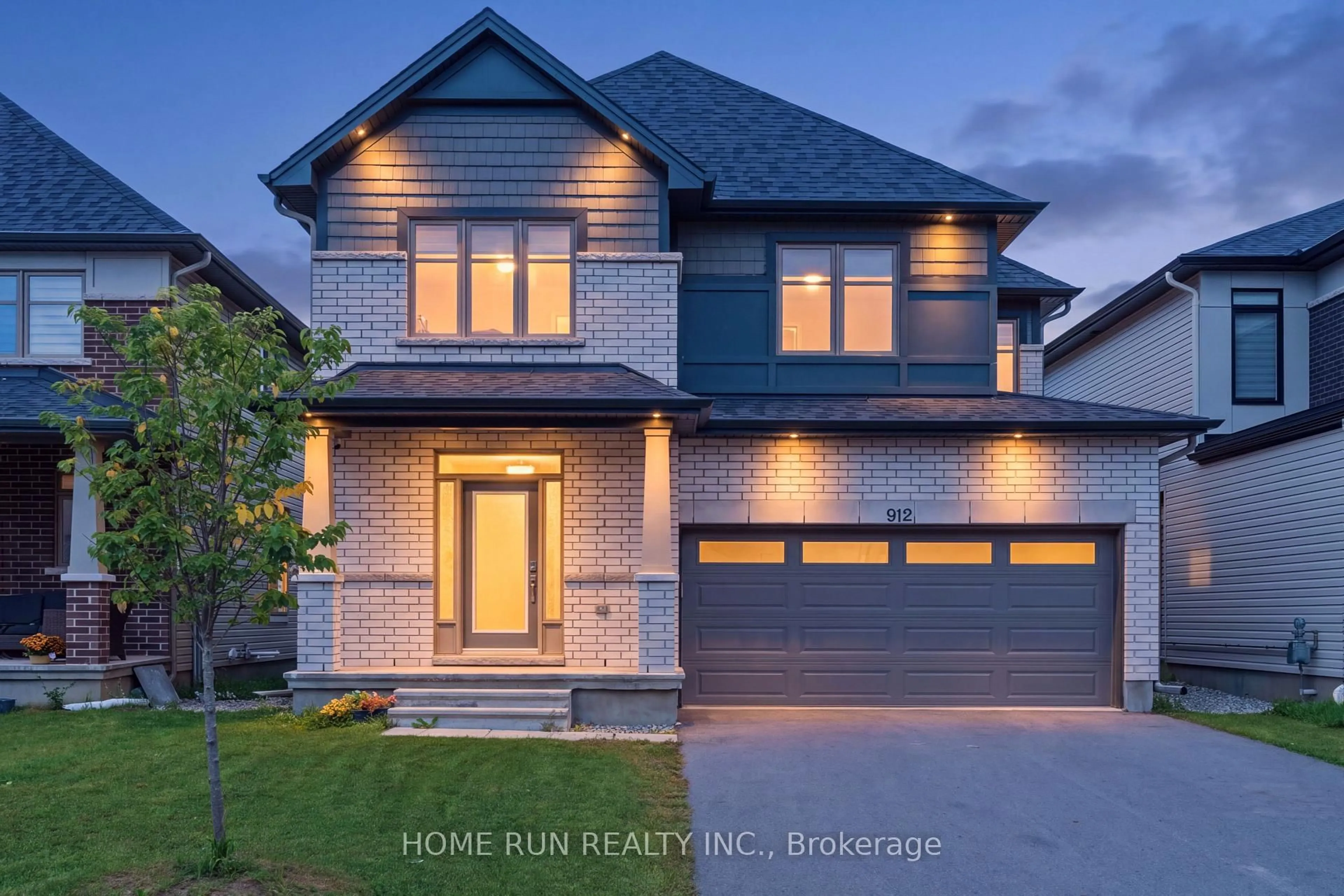 Home with brick exterior material, street for 912 Duxbury Lane, Ottawa Ontario K4M 0M2