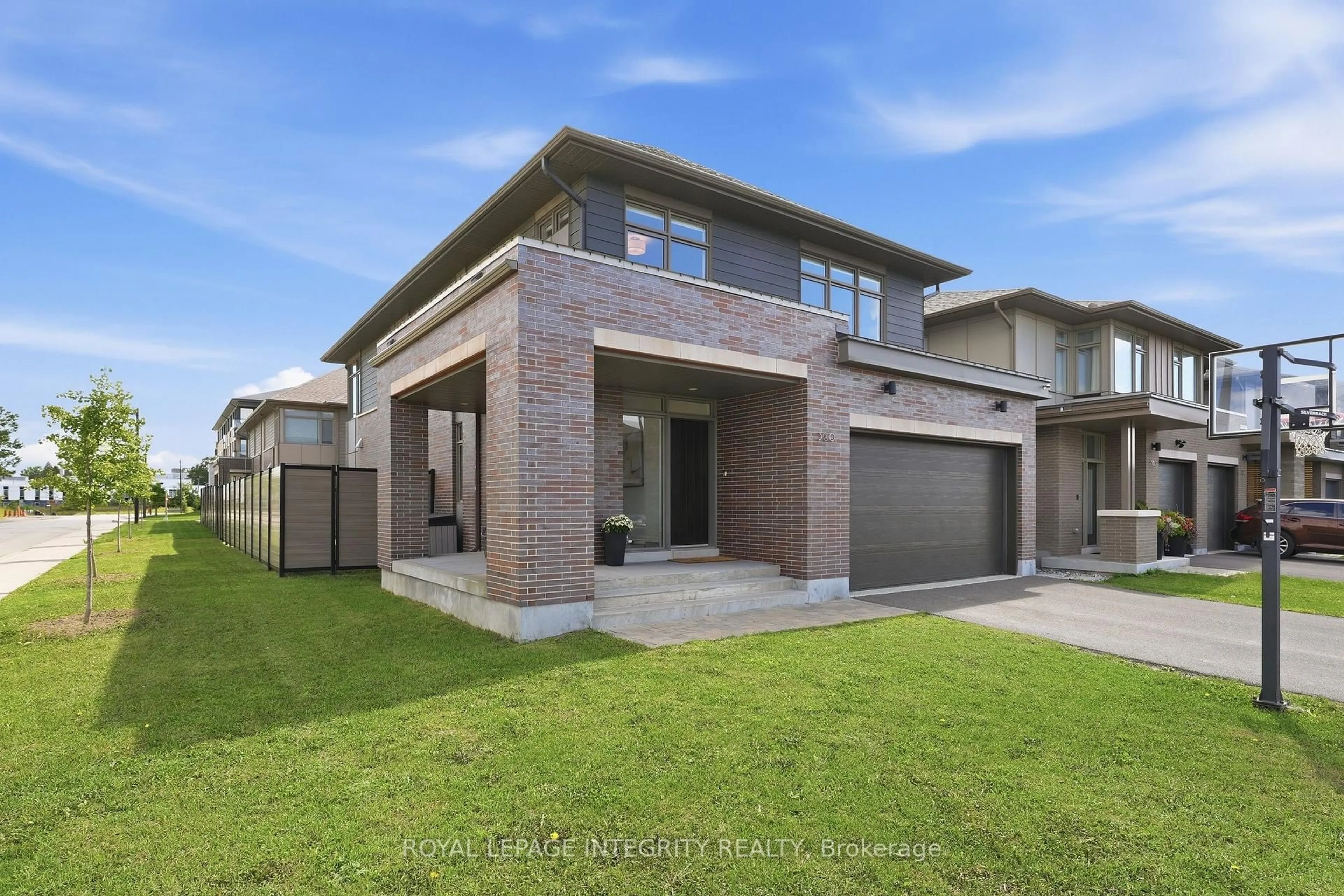 Home with brick exterior material, street for 300 Wigwas St, Ottawa Ontario K1K 4Z4
