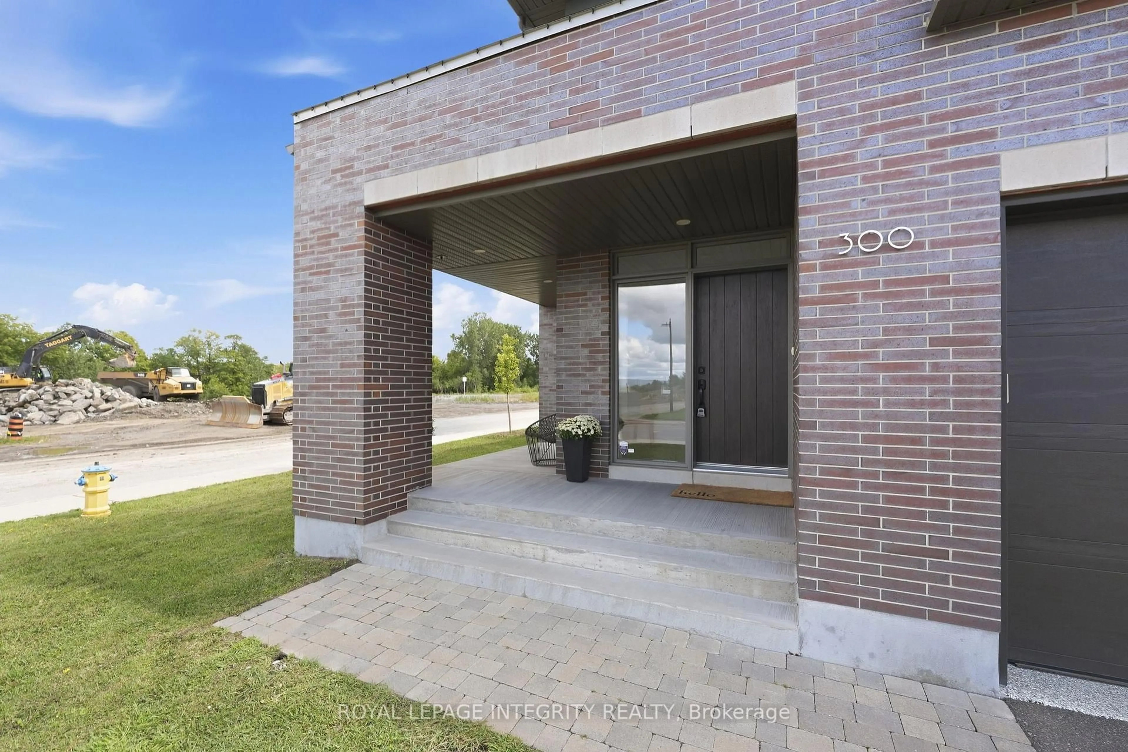 Home with brick exterior material, street for 300 Wigwas St, Ottawa Ontario K1K 4Z4