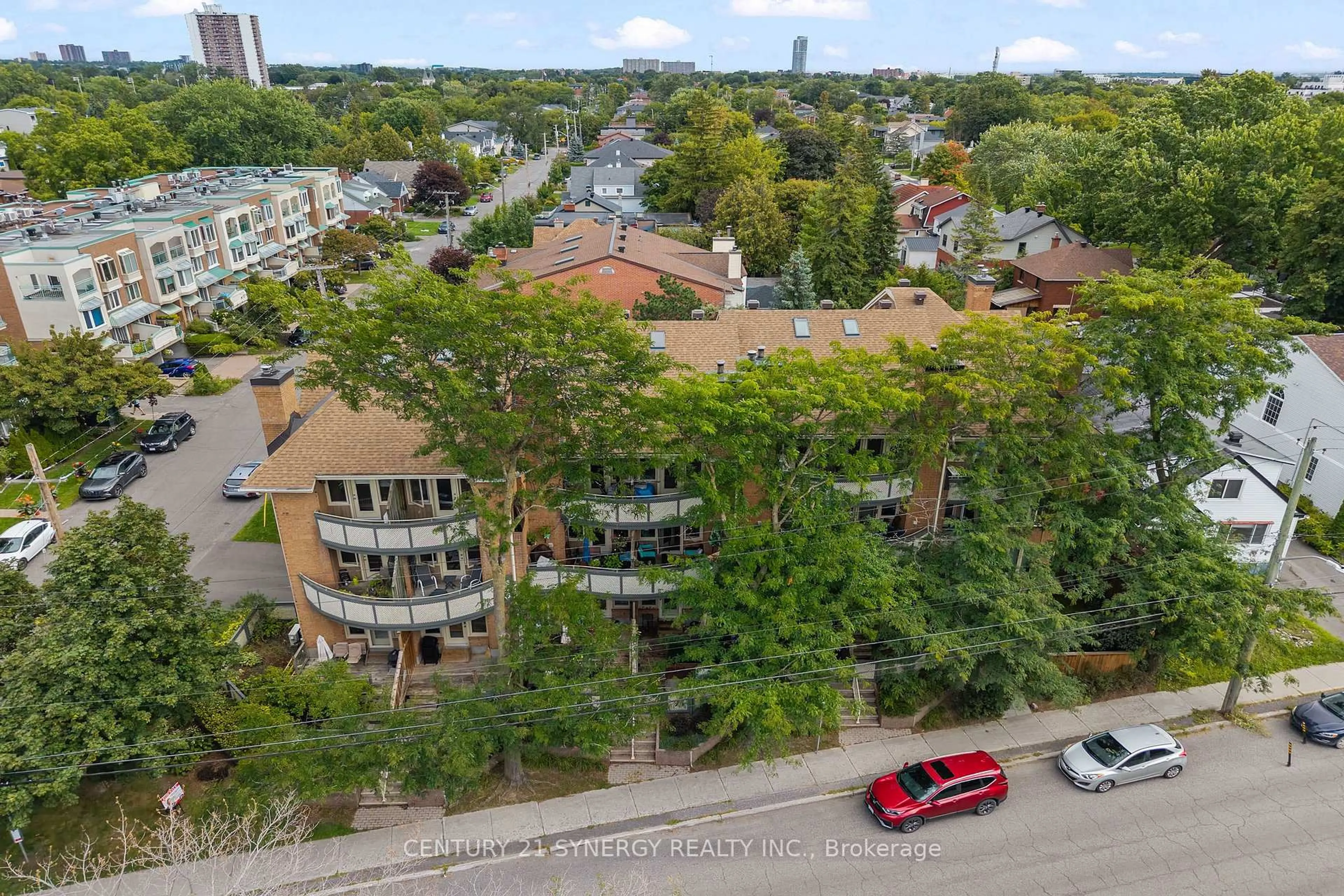 A pic from outside/outdoor area/front of a property/back of a property/a pic from drone, city buildings view from balcony for 2 Columbus Ave #5, Ottawa Ontario K1K 1R3