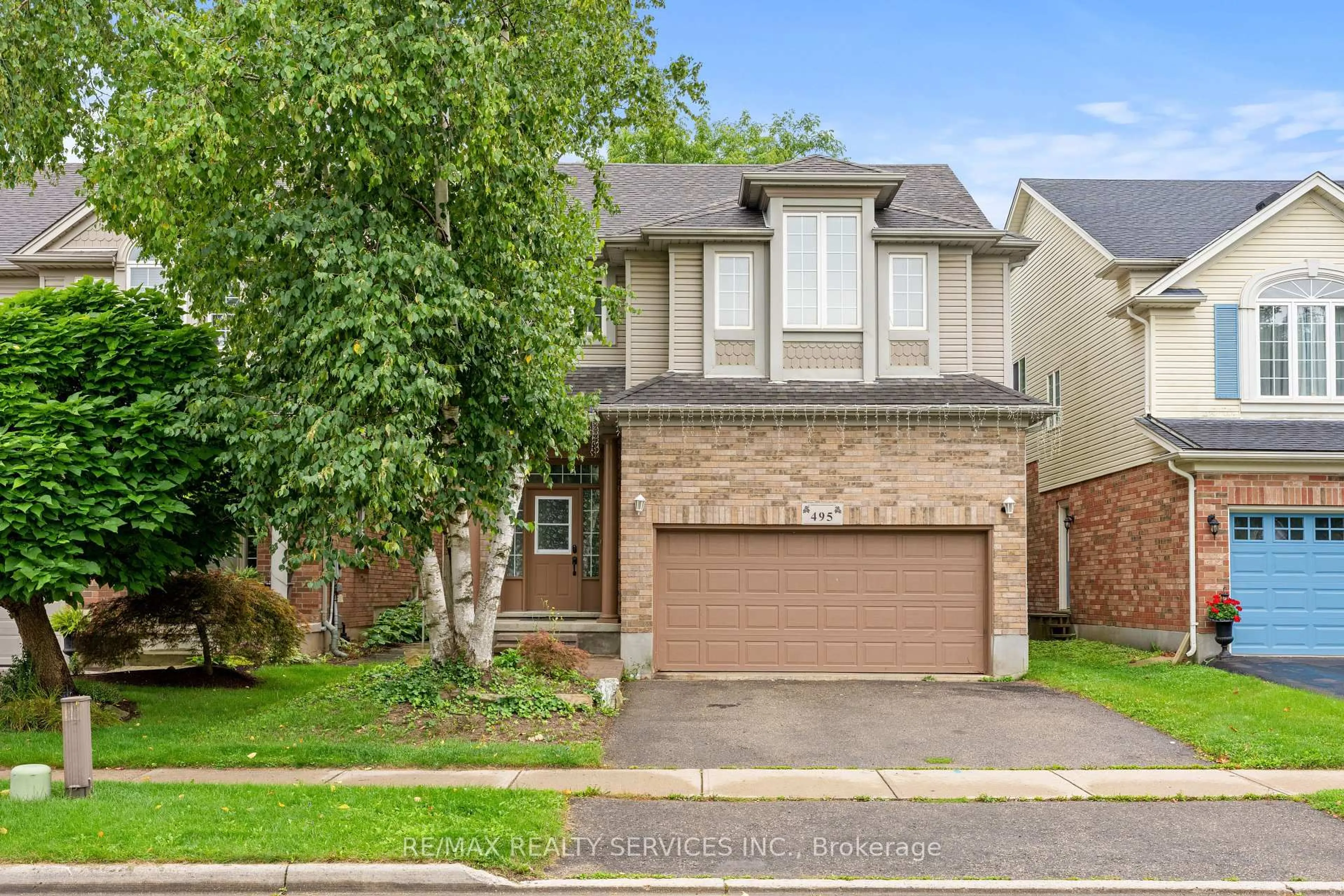 Home with brick exterior material, street for 495 Brigantine Dr, Waterloo Ontario N2K 4B7
