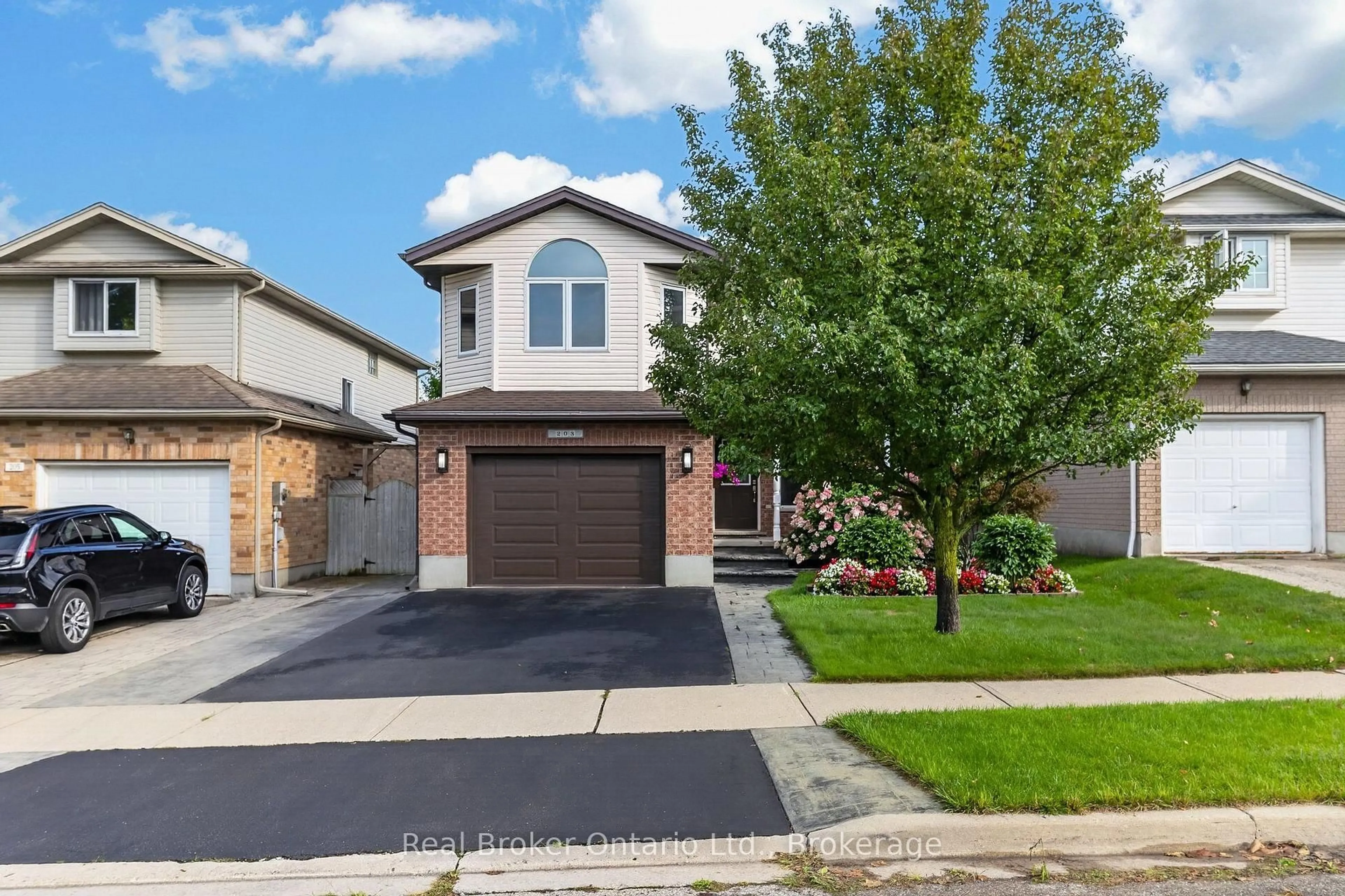 Home with brick exterior material, street for 203 Country Club Dr, Guelph Ontario N1E 3K8